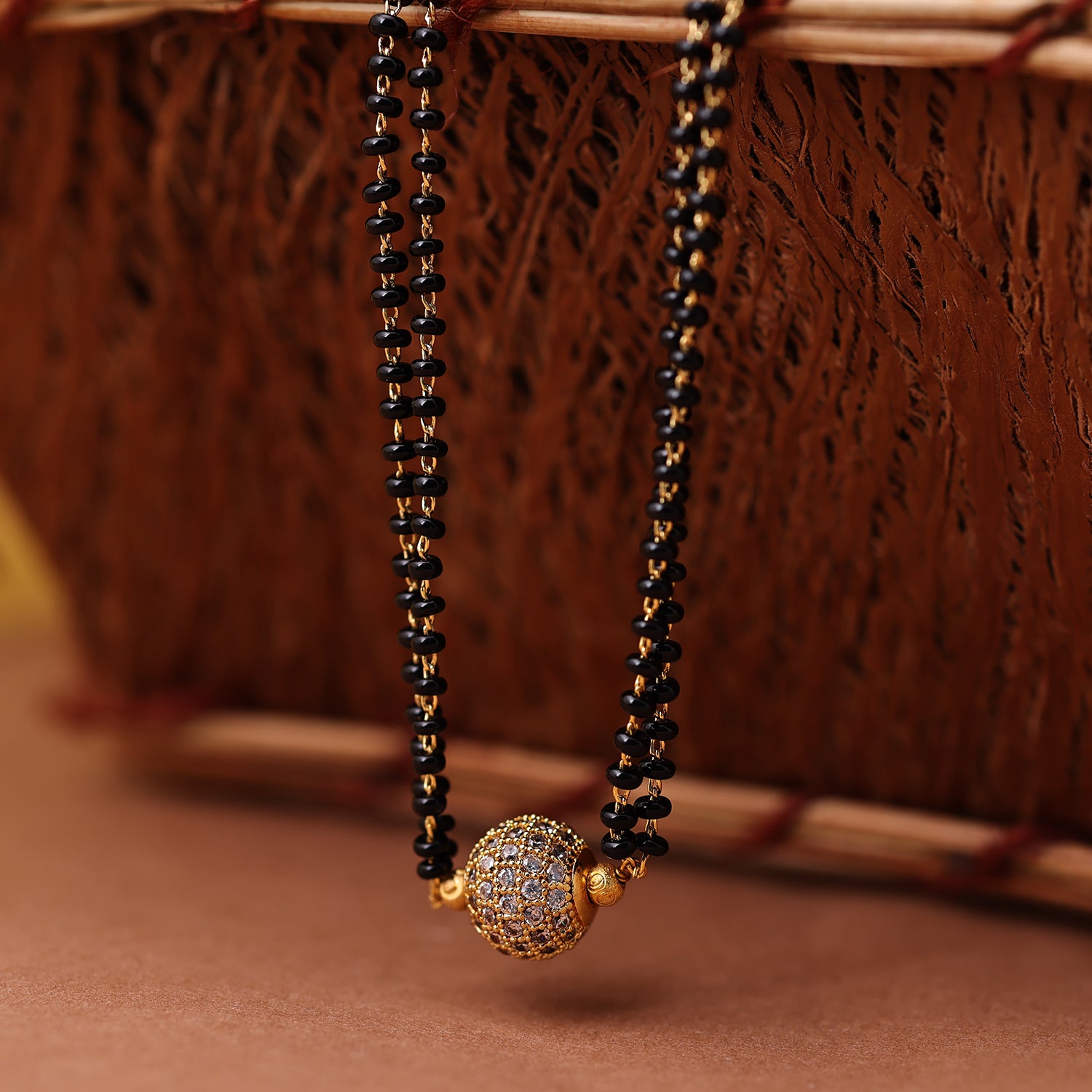 Sukkhi Gold Plated Golden Black Beads Long Mangalsutra Pendant for Women