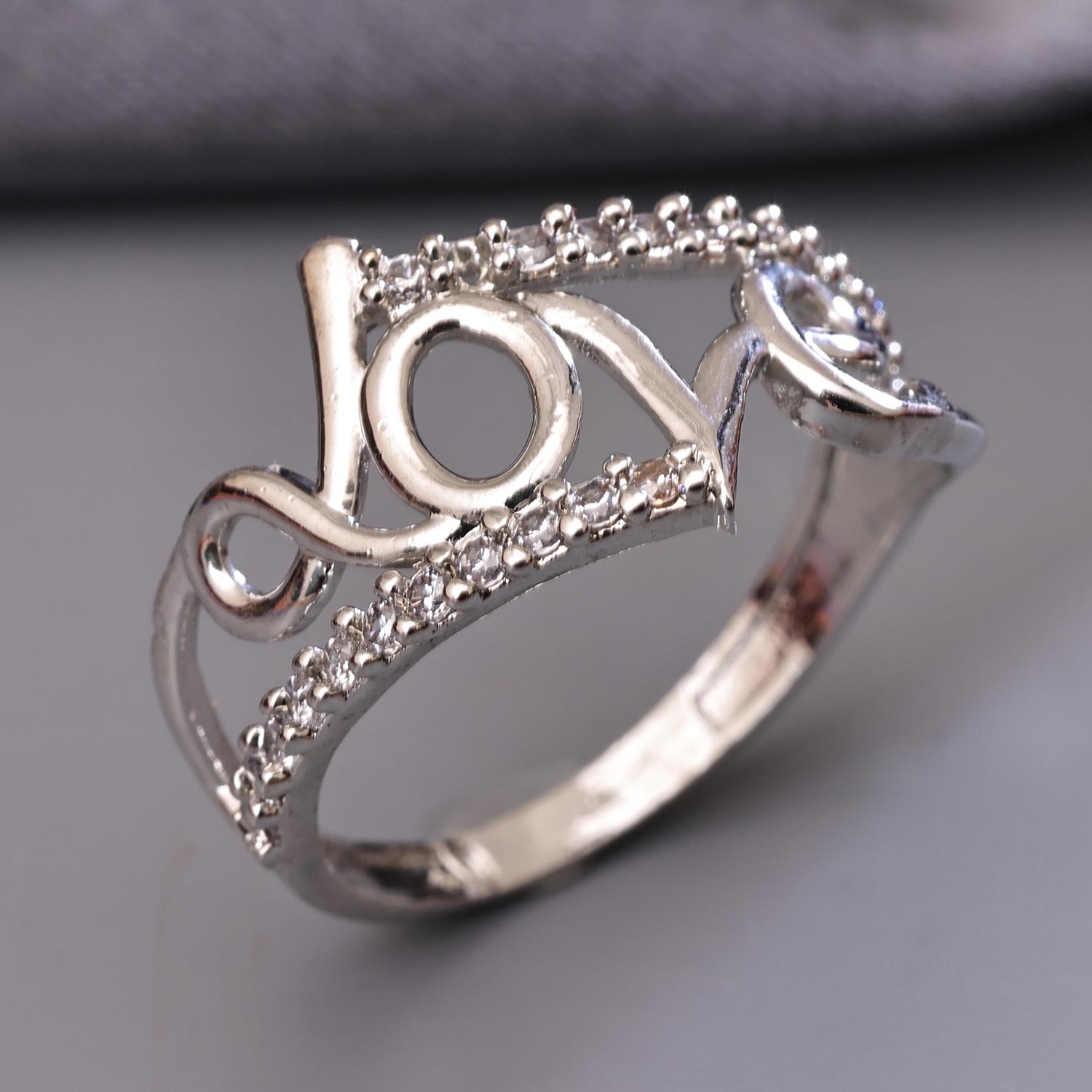 Sukkhi Attractive Silver Love Rhodium Plated CZ Ring for Women