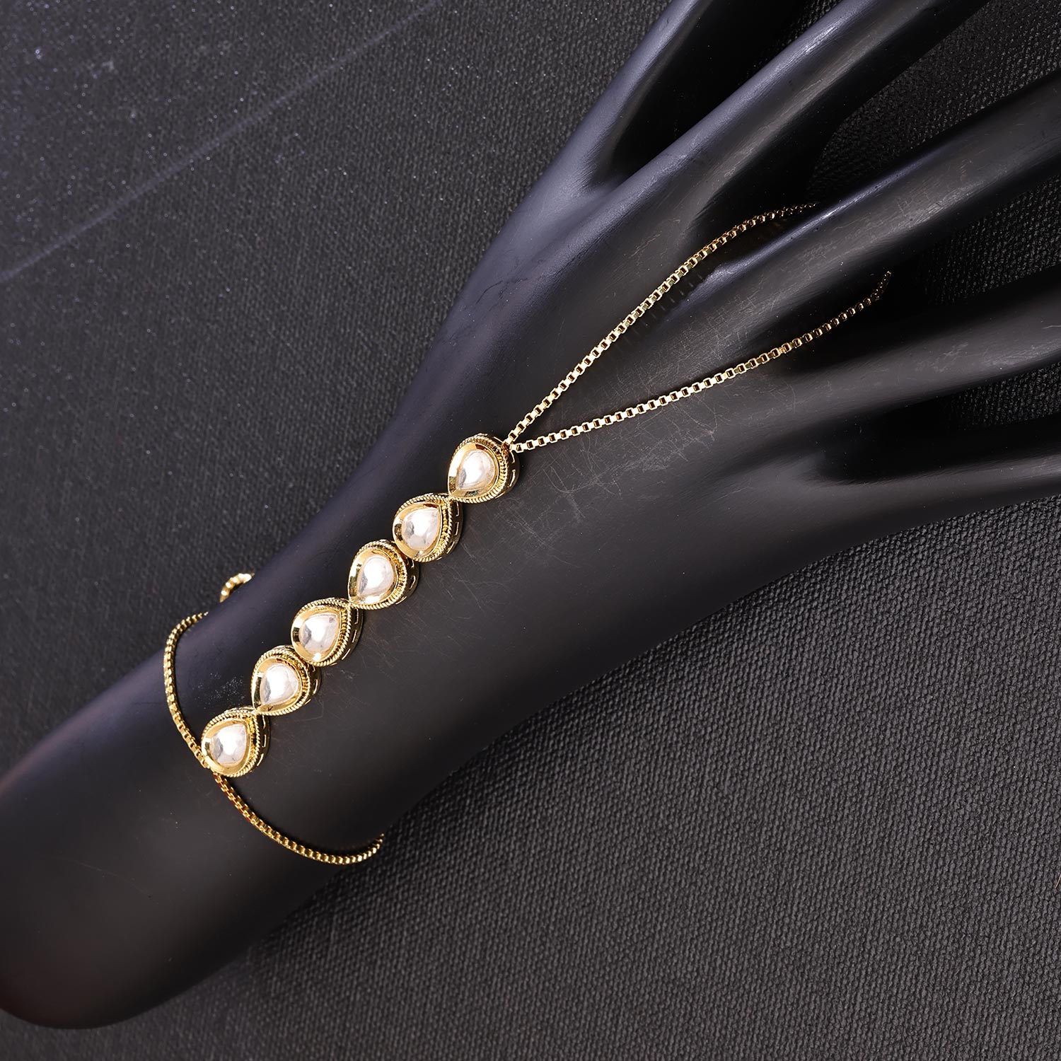 Sukkhi Skparkling Golden Gold Plated Kundan Haathpan for Women