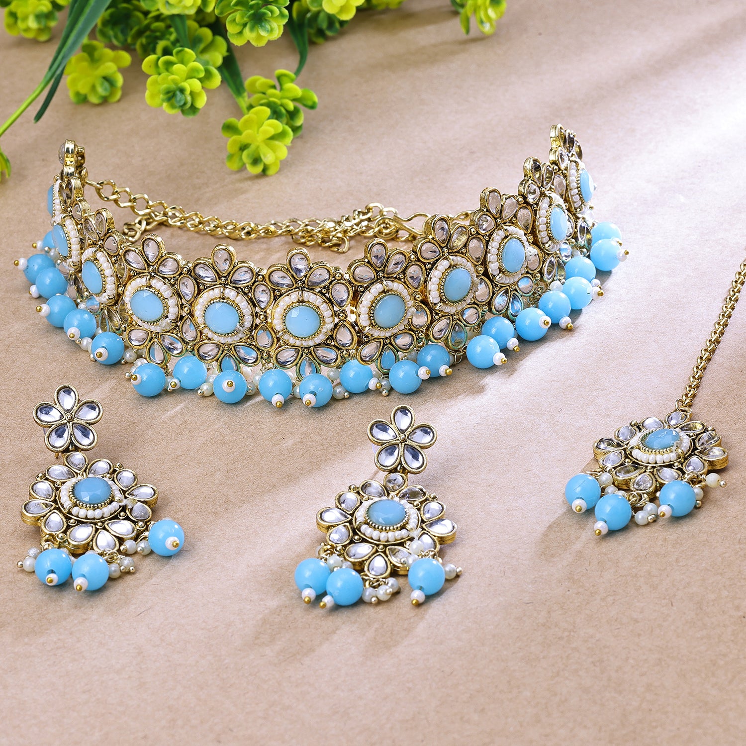 Sukkhi Gold Plated Color Stone & Kundan Sky Blue Choker Round Necklace Set for Women