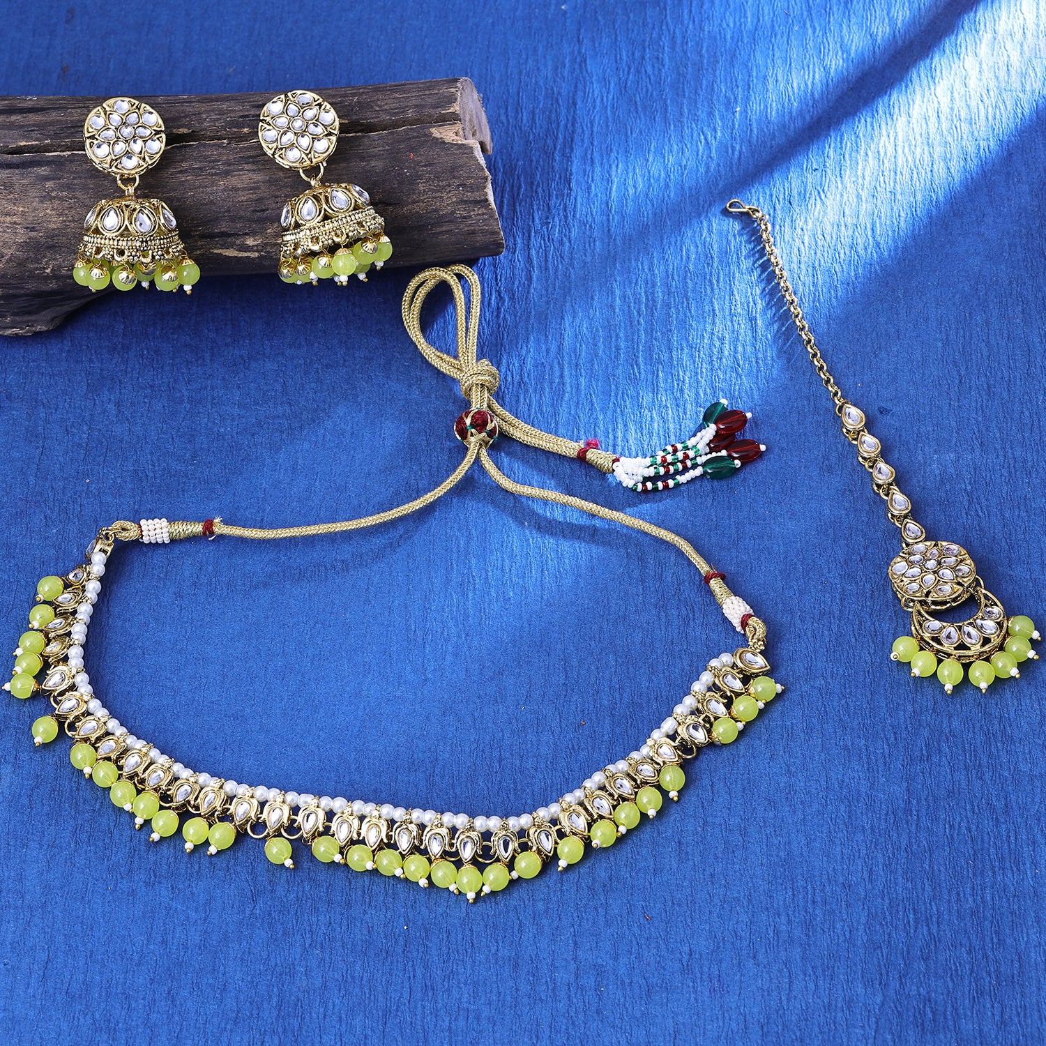 Sukkhi Haunting Gold Plated Yellow Kundan Choker Necklace Set With Maang Tikka for Women