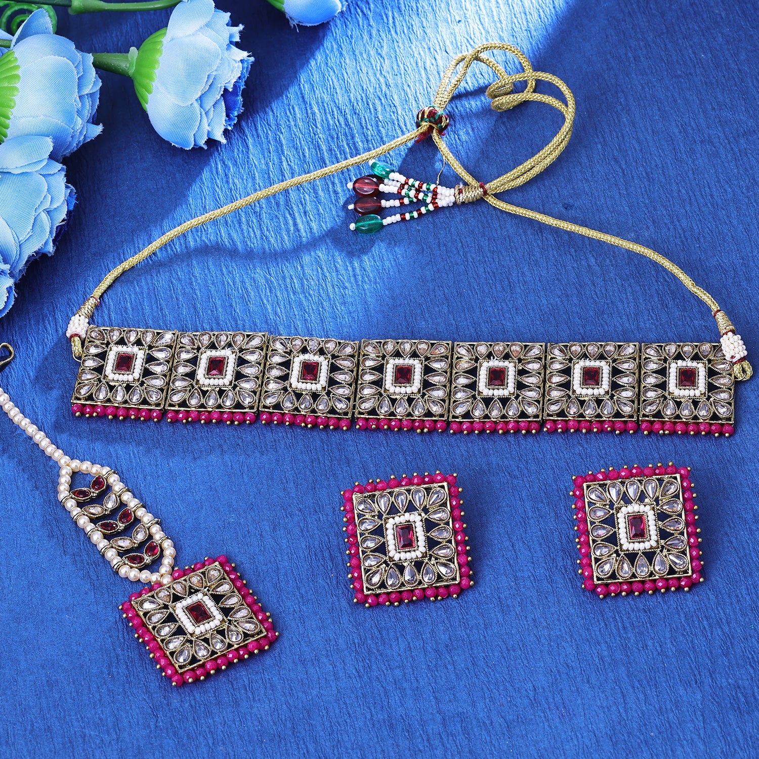 Sukkhi Intriguing Gold Plated Purple Reversible Stone Choker Necklace Set With Maang Tikka for Women