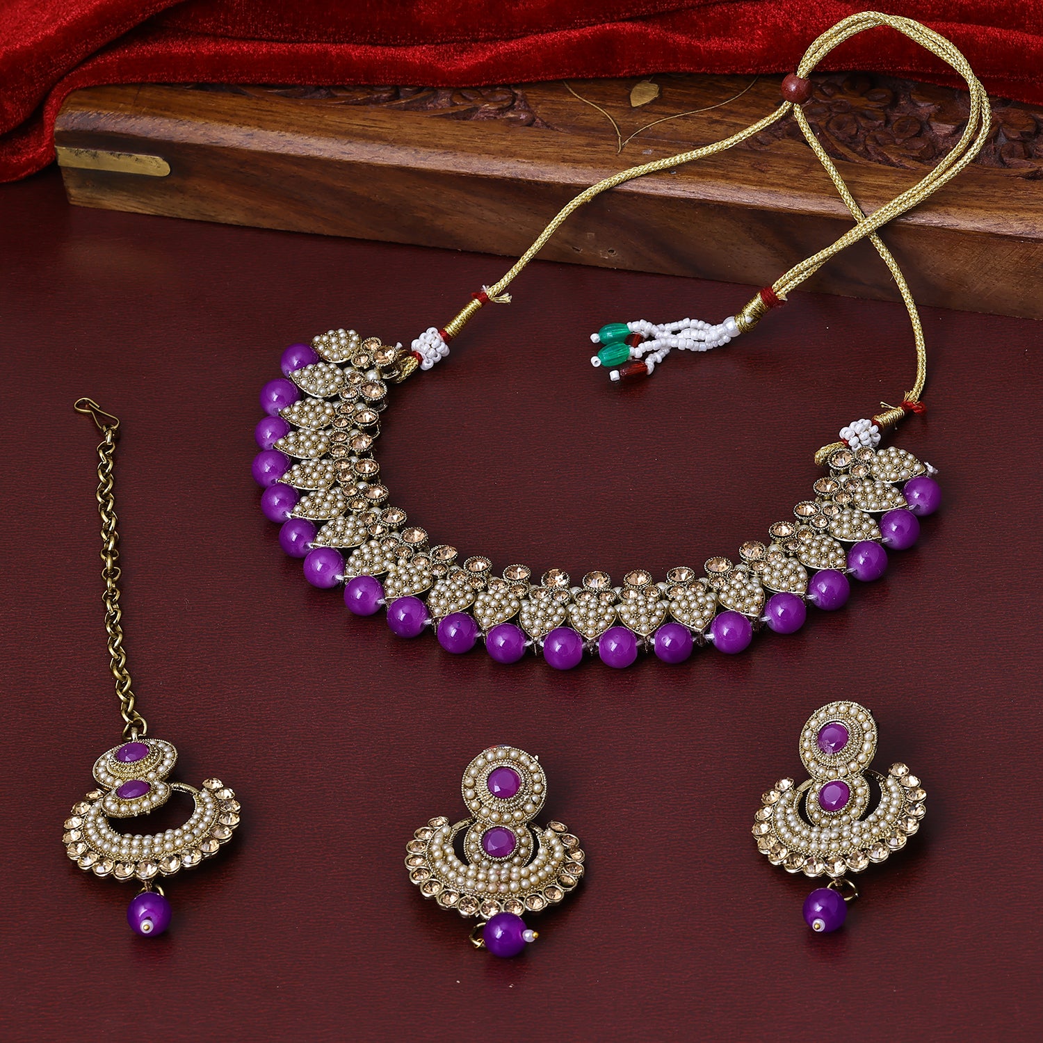 Sukkhi Handsome Gold Plated Purple Austrian Stone Choker Necklace Set With Maang Tikka for Women