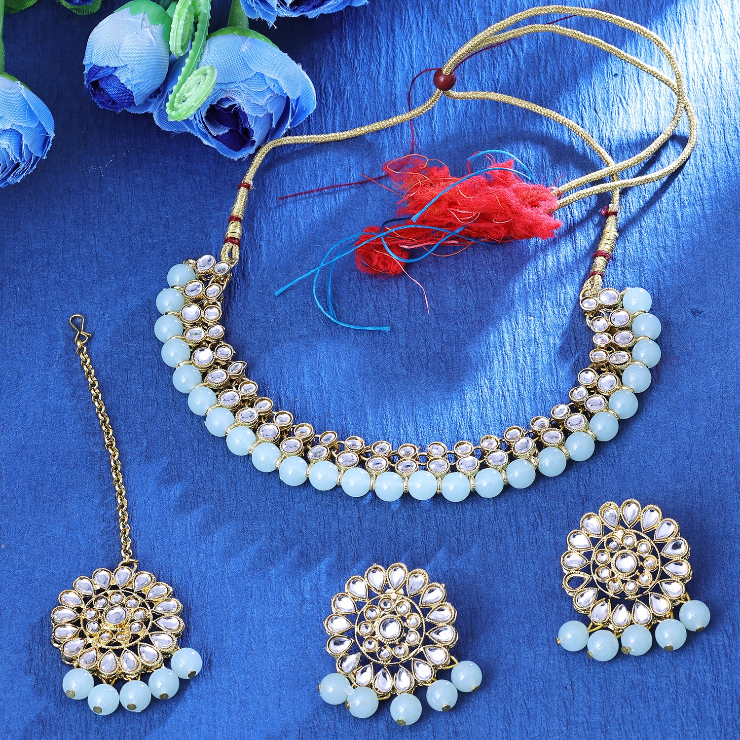 Sukkhi Personable Gold Plated Aqua Blue Kundan Choker Necklace Set With Maang Tikka for Women