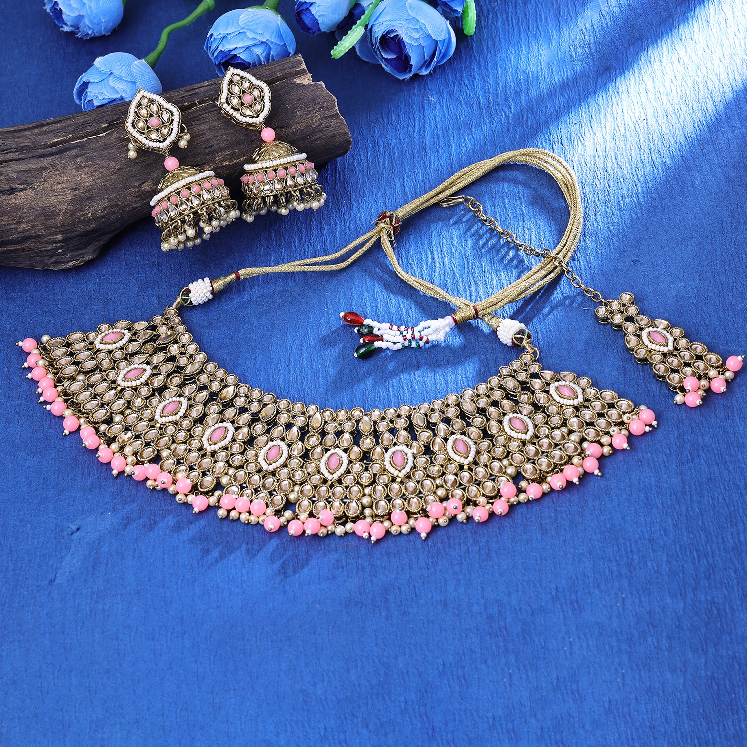 Sukkhi Photogenic Gold Plated Light Pink Color Stone Collar Necklace Set With Maang Tikka for Women