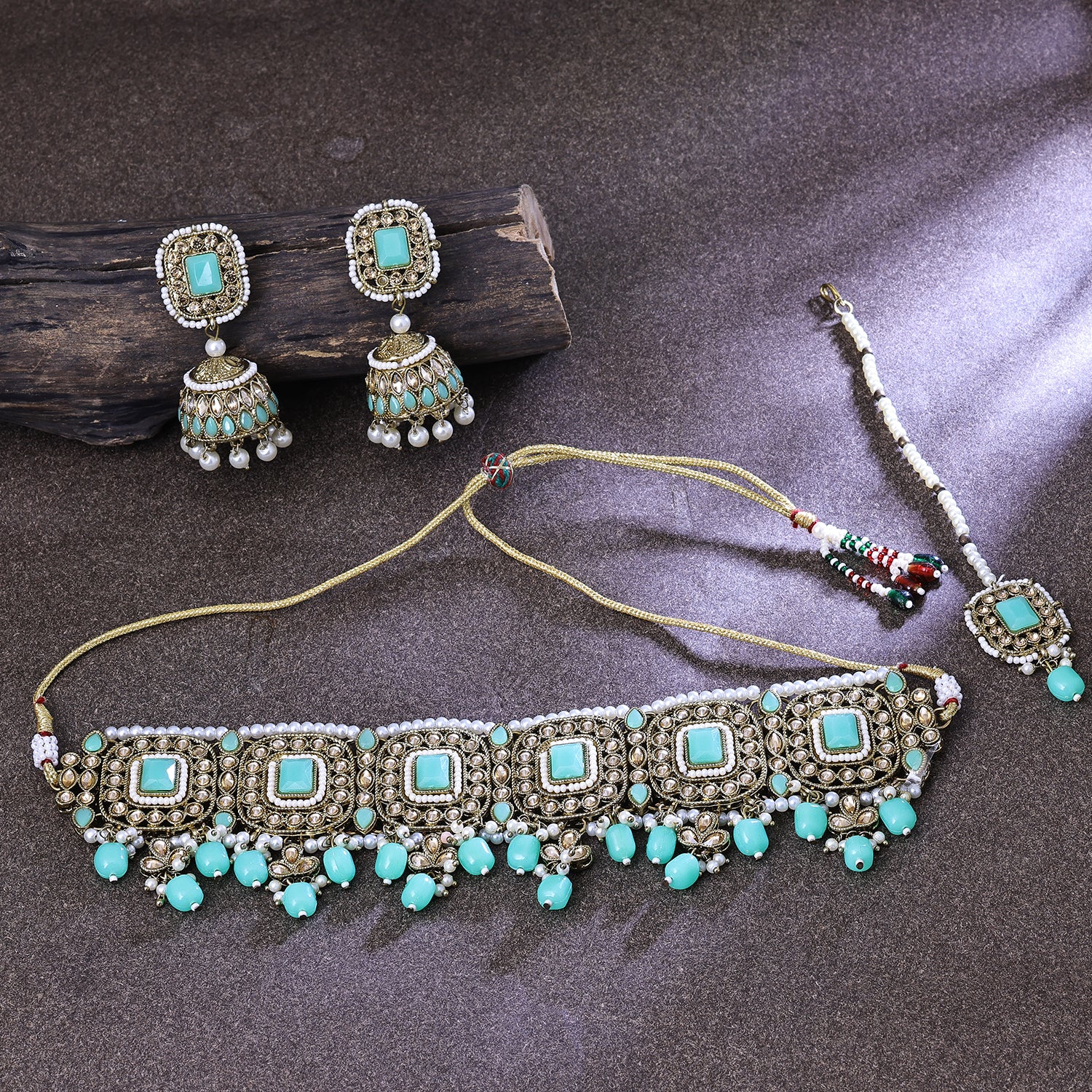 Sukkhi Spellbinding Gold Plated Sky Blue LCT Stone Choker Necklace Set With Maang Tikka for Women