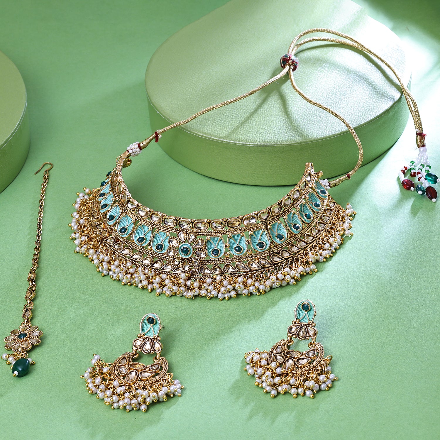 Sukkhi Enticing Gold Plated Sky Blue LCT Stone Collar Necklace Set With Maang Tikka for Women