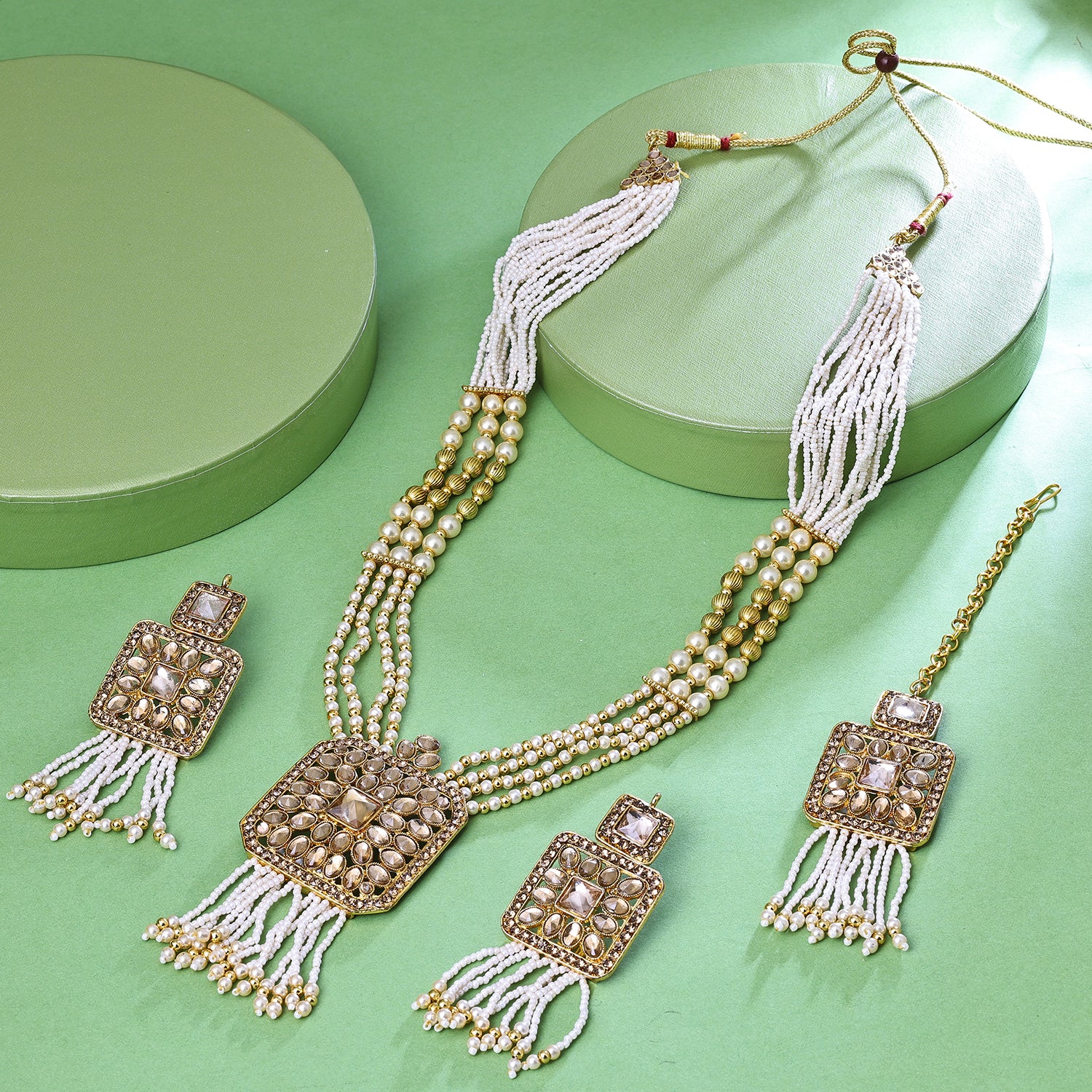 Sukkhi Delightful Gold Plated Golden & White LCT Stone & Pearl Long Haram Necklace Set With Maang Tikka for Women