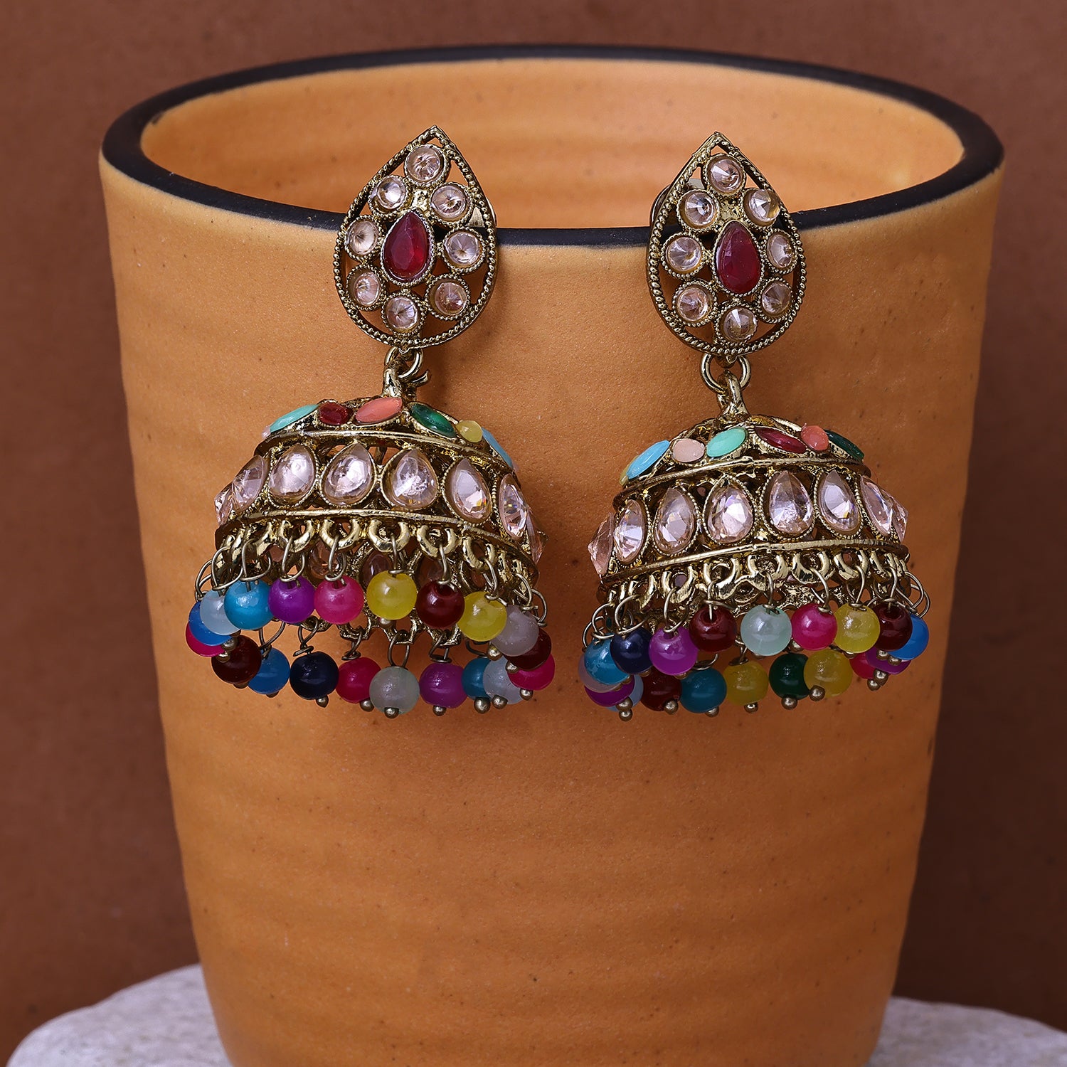 Sukkhi Fetching Gold Plated Multicolor Color Stone Jhumki Earrings for Women