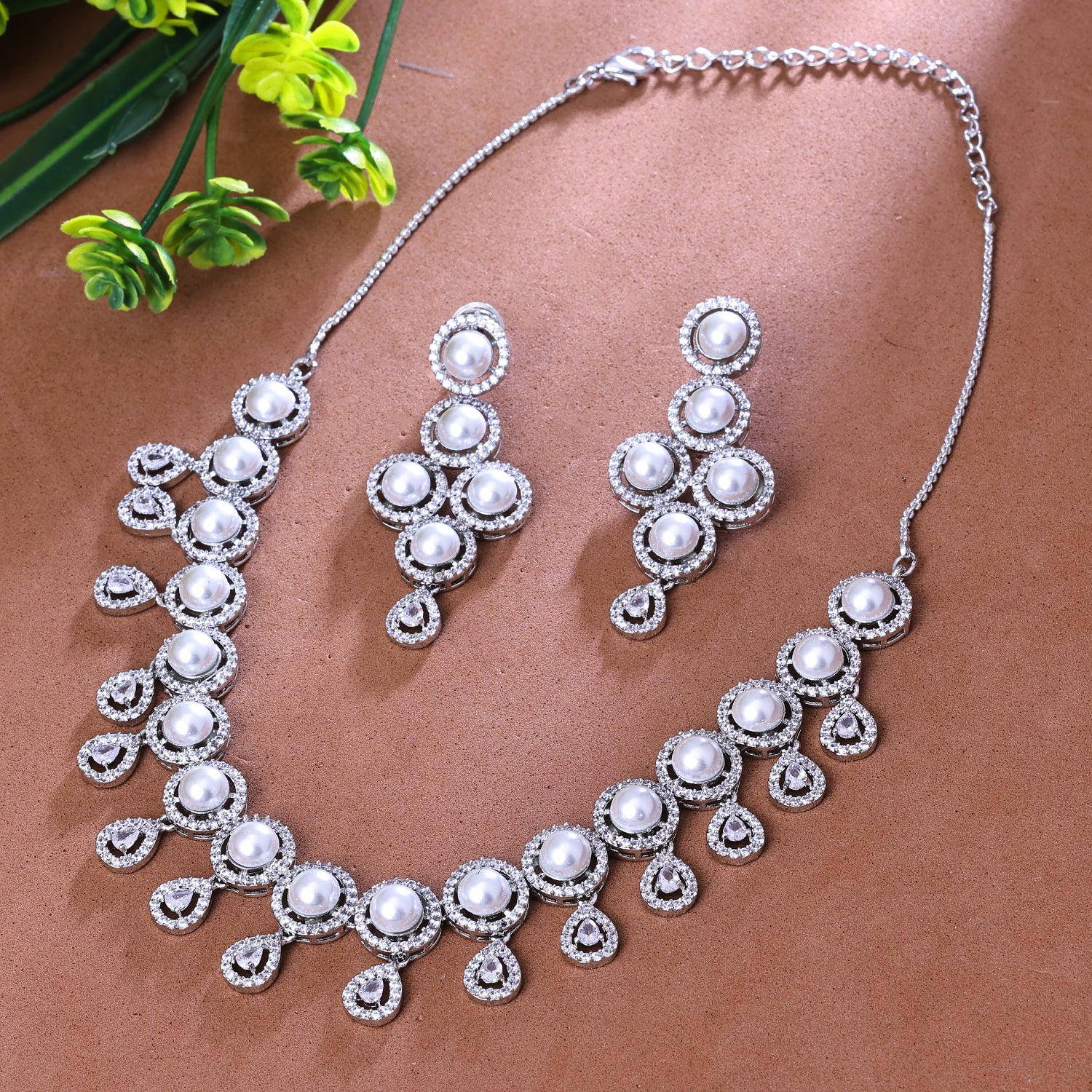 Sukkhi Arresting Silver CZ Stone Rhodium Plated Traditional Necklace Set for Women