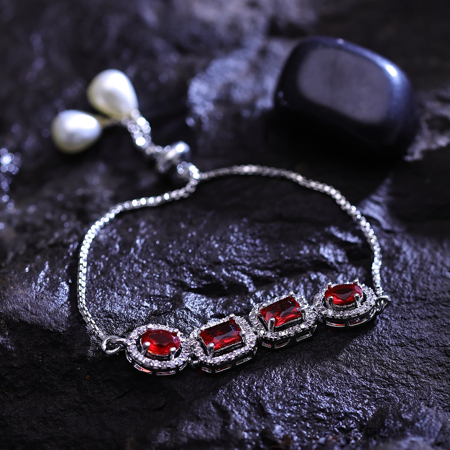Sukkhi Chocolate-Box Red CZ Stone Rhodium Plated Party Wear Bracelet for Women