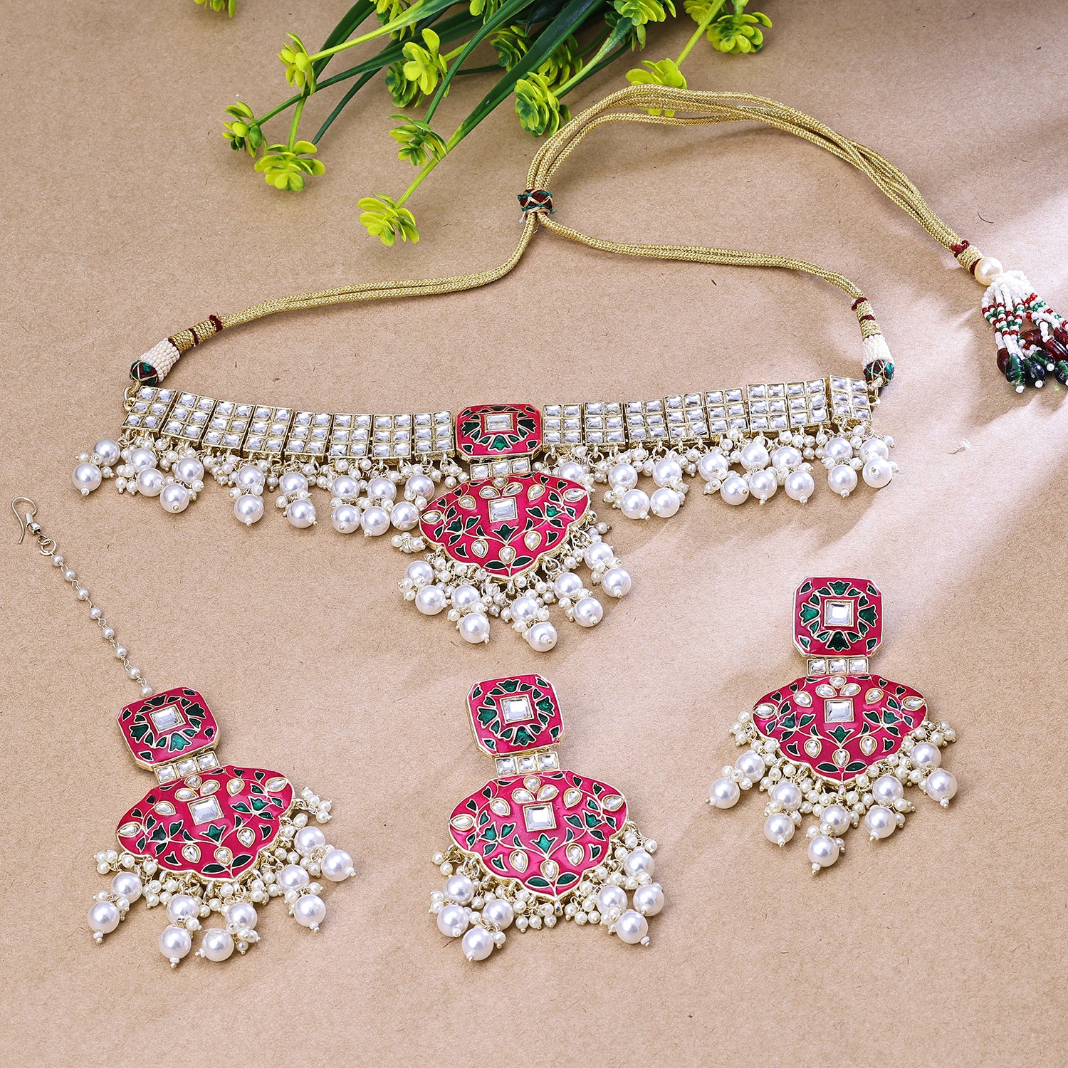 Sukkhi High-Test Pink And White Austrian Stone Gold Plated Traditional Necklace Set With Maang Tikka for Women
