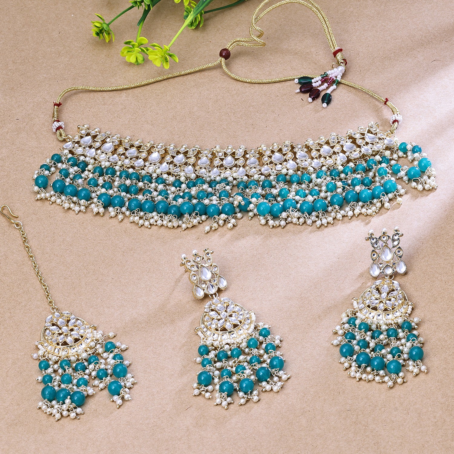 Sukkhi Riveting Blue Kundan Gold Plated Traditional Necklace Set With Maang Tikka for Women