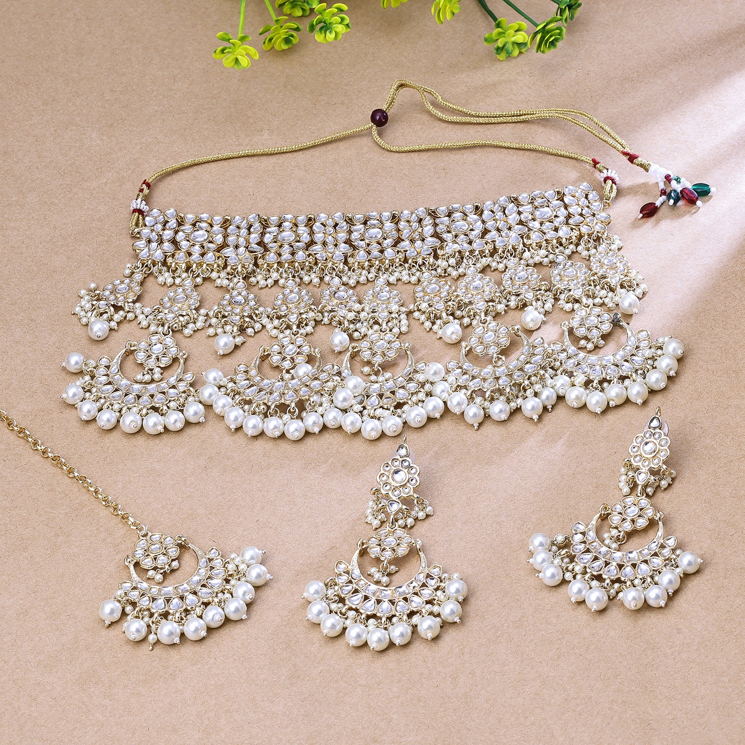 Sukkhi Tempting White Kundan Gold Plated Traditional Necklace Set With Maang Tikka for Women