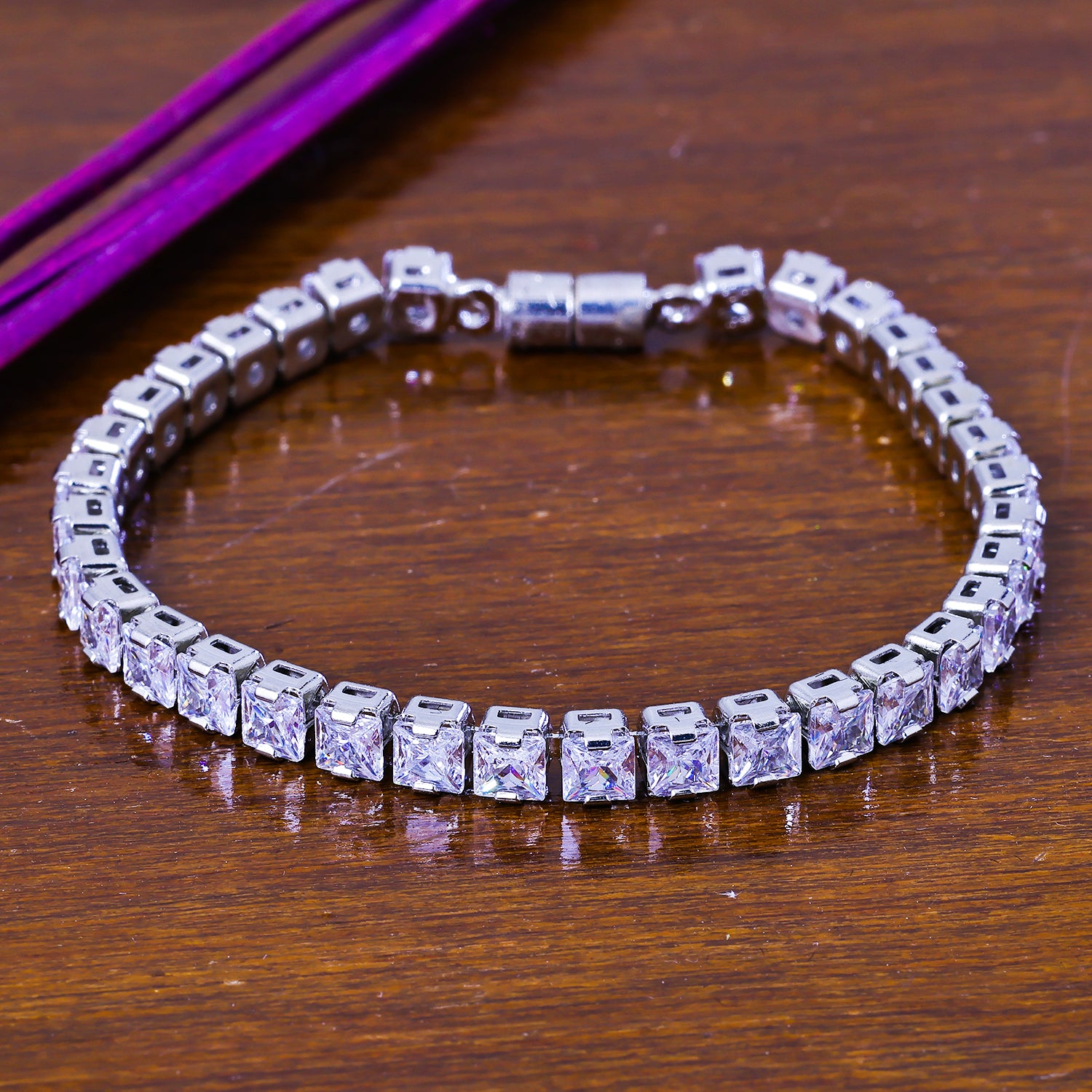 Sukkhi Appealing White CZ Stone Rhodium Plated Party Wear Bracelet for Women