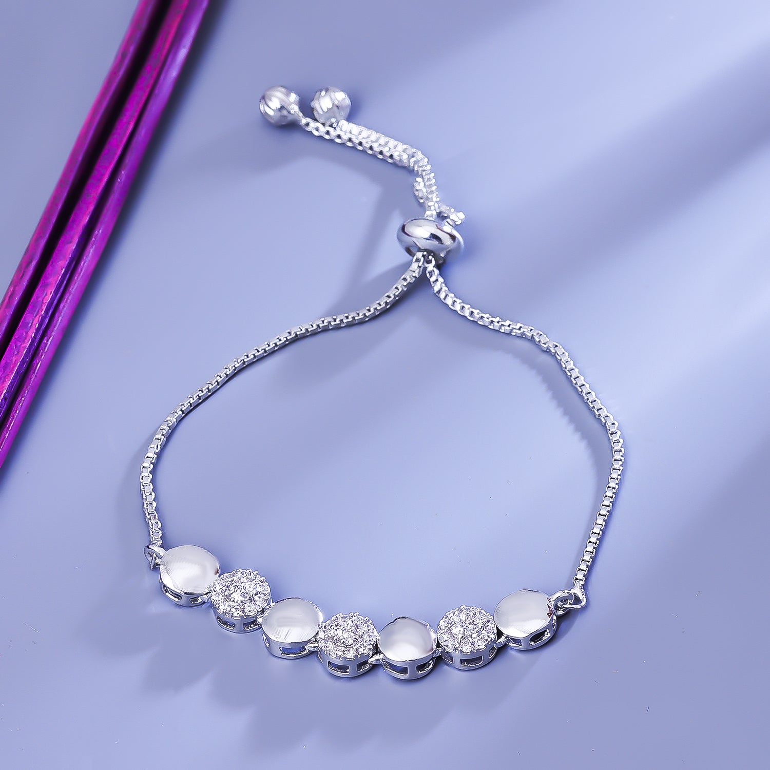 Sukkhi Fascinating Silver CZ Stone Rhodium Plated Party Wear Bracelet for Women