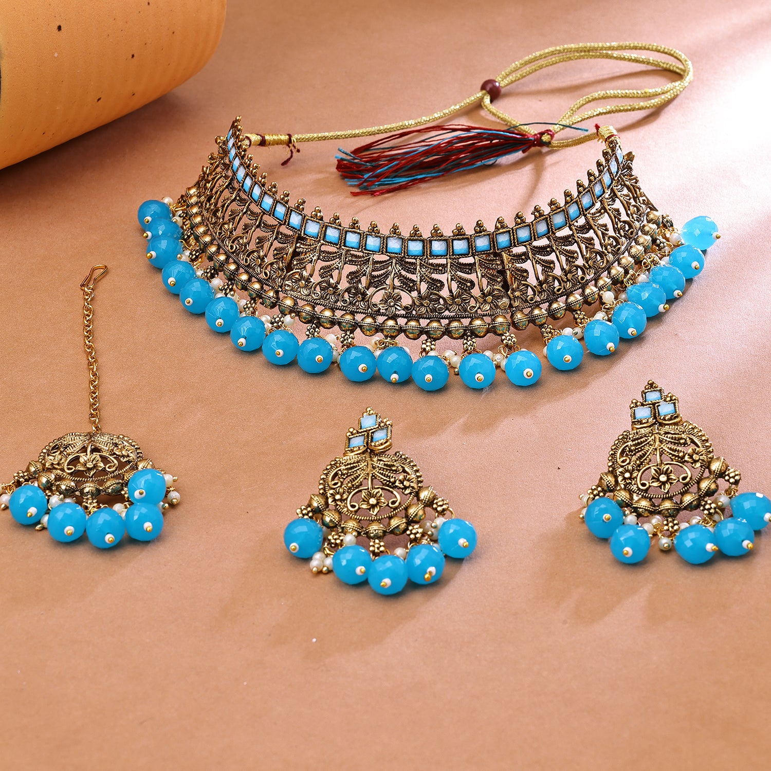 Sukkhi Glimmery Gold Plated Choker Necklace Set For Women
