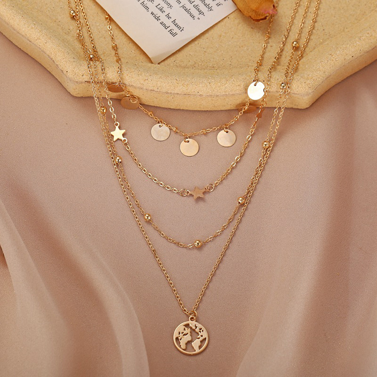 Scintillare by Sukkhi Dazzling Gold Plated Star Inspired Multi Layered Necklace for Women