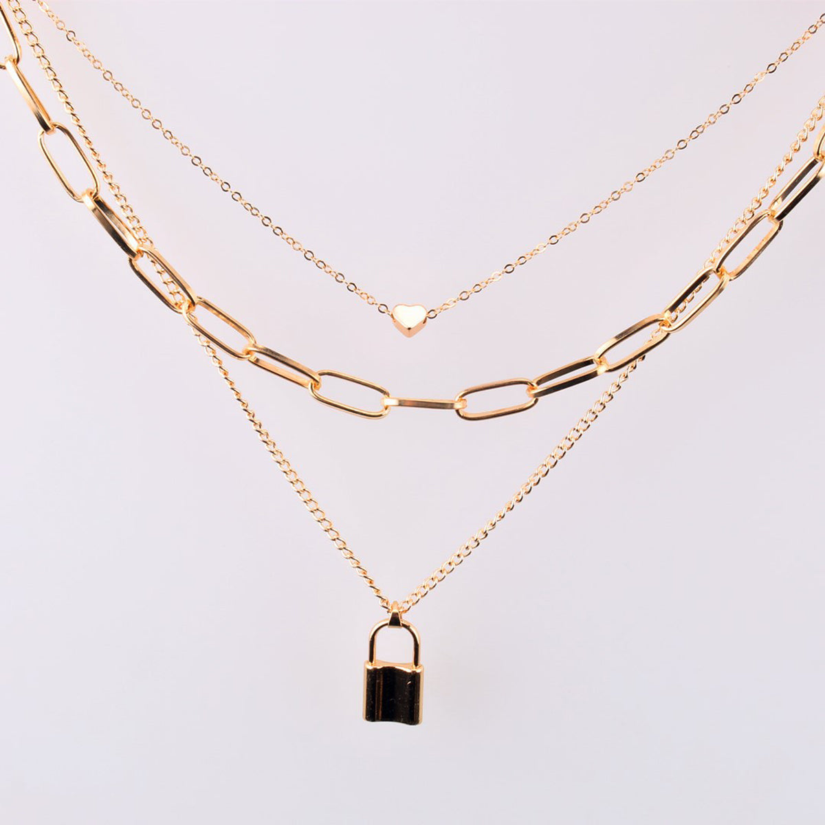 Scintillare by Sukkhi Modish Gold Plated Multi Layered Heart Lock Necklace for Women