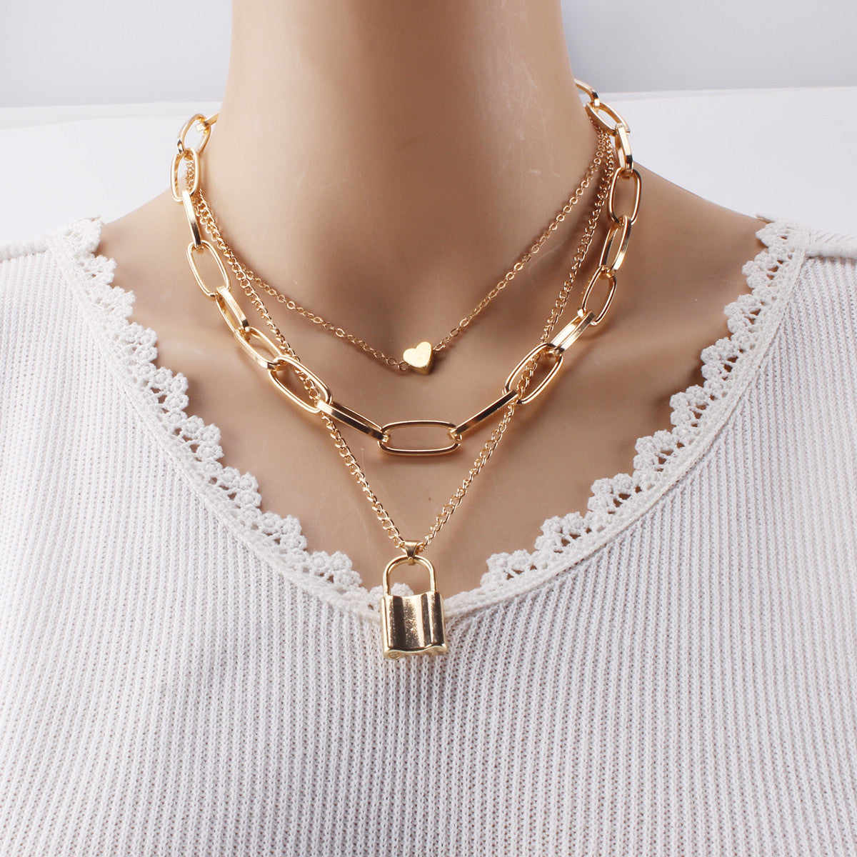 Scintillare by Sukkhi Modish Gold Plated Multi Layered Heart Lock Necklace for Women