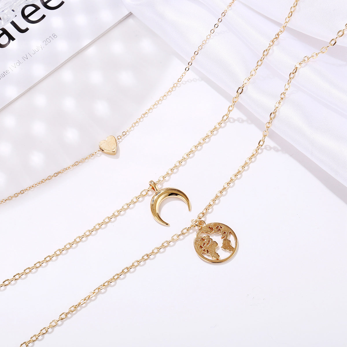 Scintillare by Sukkhi Trendy Gold Plated Tripal Layered Moon Heart Necklace for Women