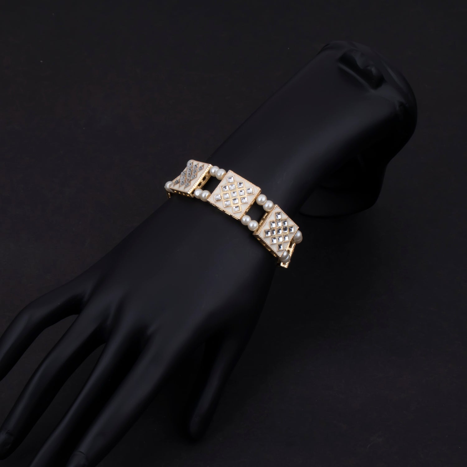 Sukkhi Trendy Gold Plated Kundan & Pearl Braclete For Women