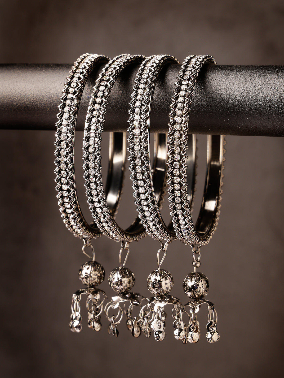 Sukkhi Eye-Catching Oxidised Rhodium Plated AD Stone Studded with Ball Hanging Silver Bracelet Bangle Set Jewellery for Women & Girls |Set of 4|B106024