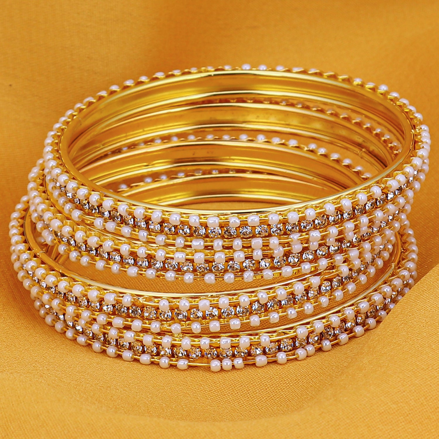 Sukkhi Fascinating Pearl Gold Plated Austrian Diamond Bangles Set of 4 for Women B71518ADRL550