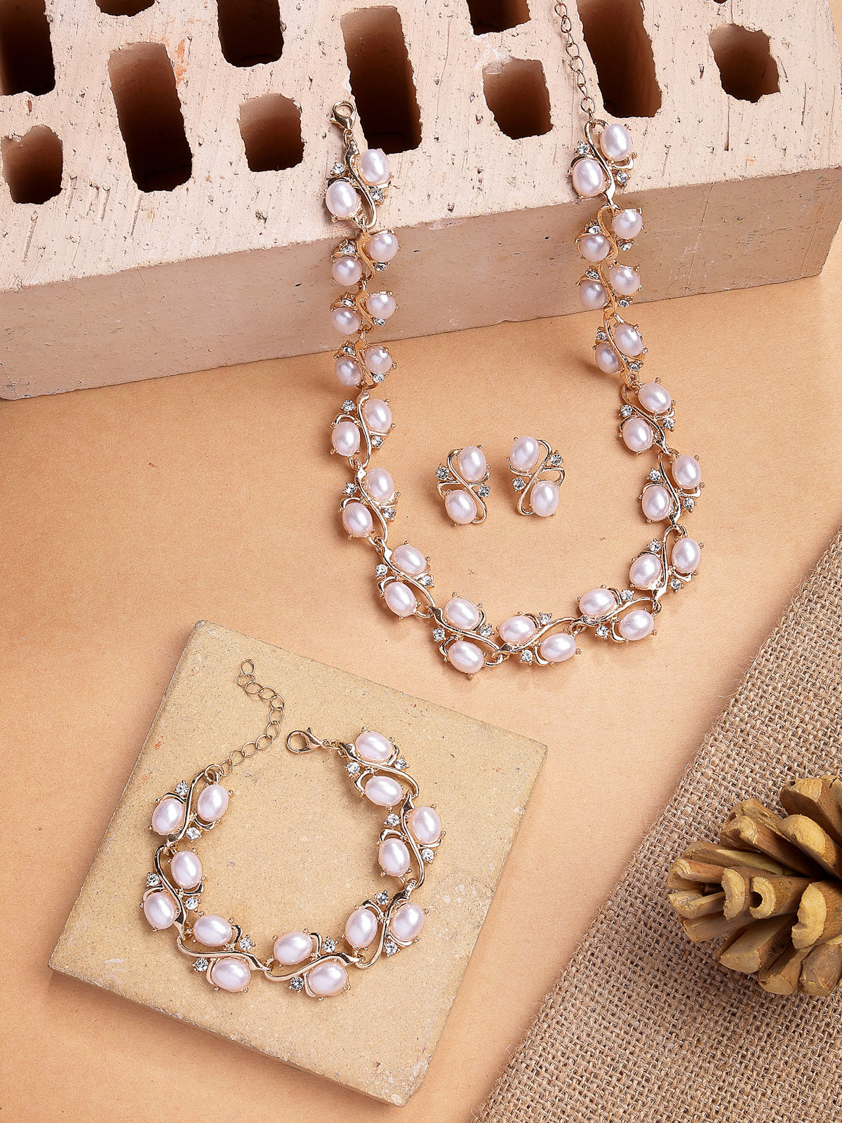 Sukkhi Eye-Catchy Stylish Design Gold Plated Faux Pearls Studded White Choker Necklace with Studs Earring & Bracelet Combo Jewellery Set For Women & Girls|CBMIX107315