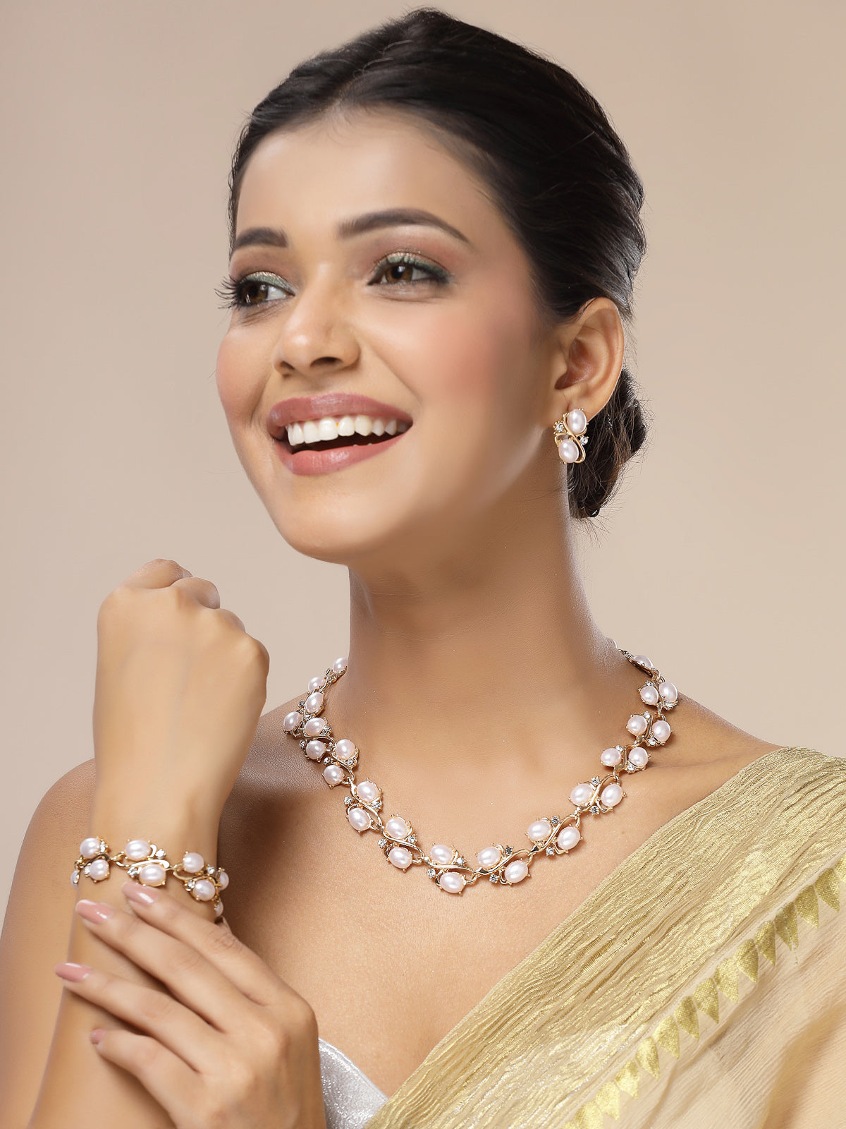 Sukkhi Eye-Catchy Stylish Design Gold Plated Faux Pearls Studded White Choker Necklace with Studs Earring & Bracelet Combo Jewellery Set For Women & Girls|CBMIX107315