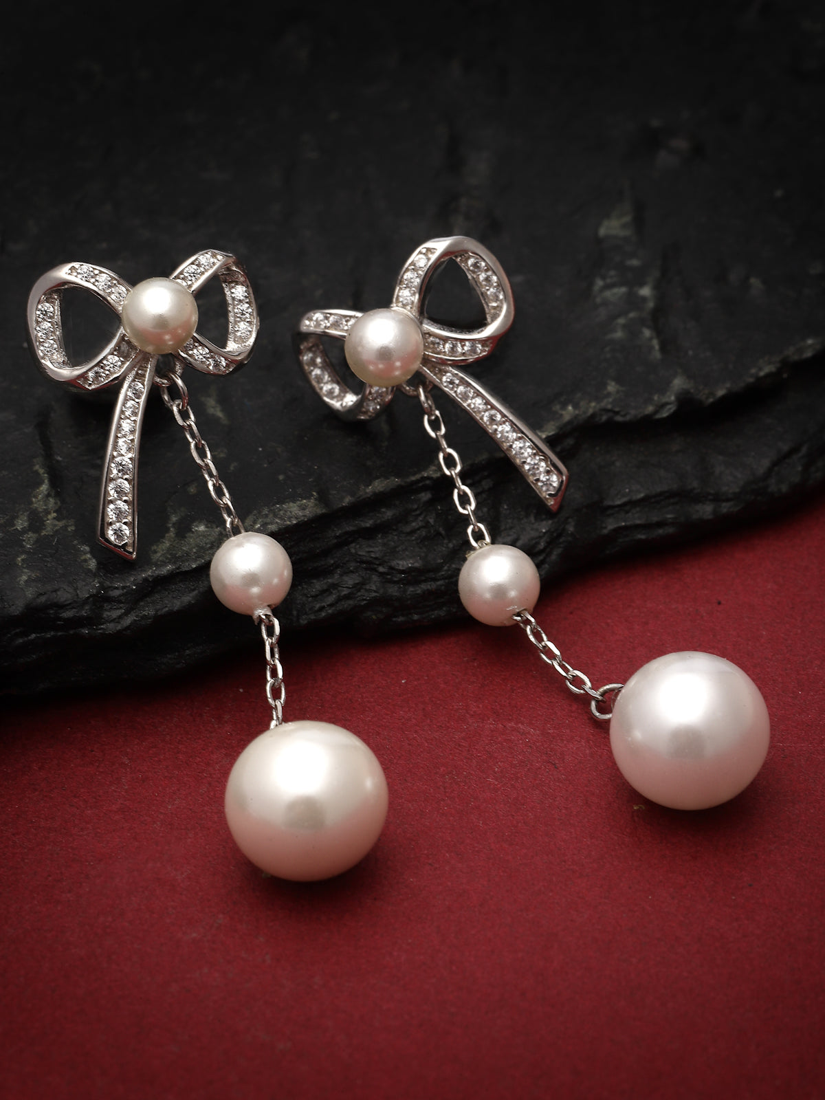 Pissara by Sukkhi Shimmering 925 Sterling Silver Bow Shaped Cubic Zirconia Dangle Earrings For Women & Girls|with Authenticity Certificate, 925 Stamp & 6 Months Warranty E105150