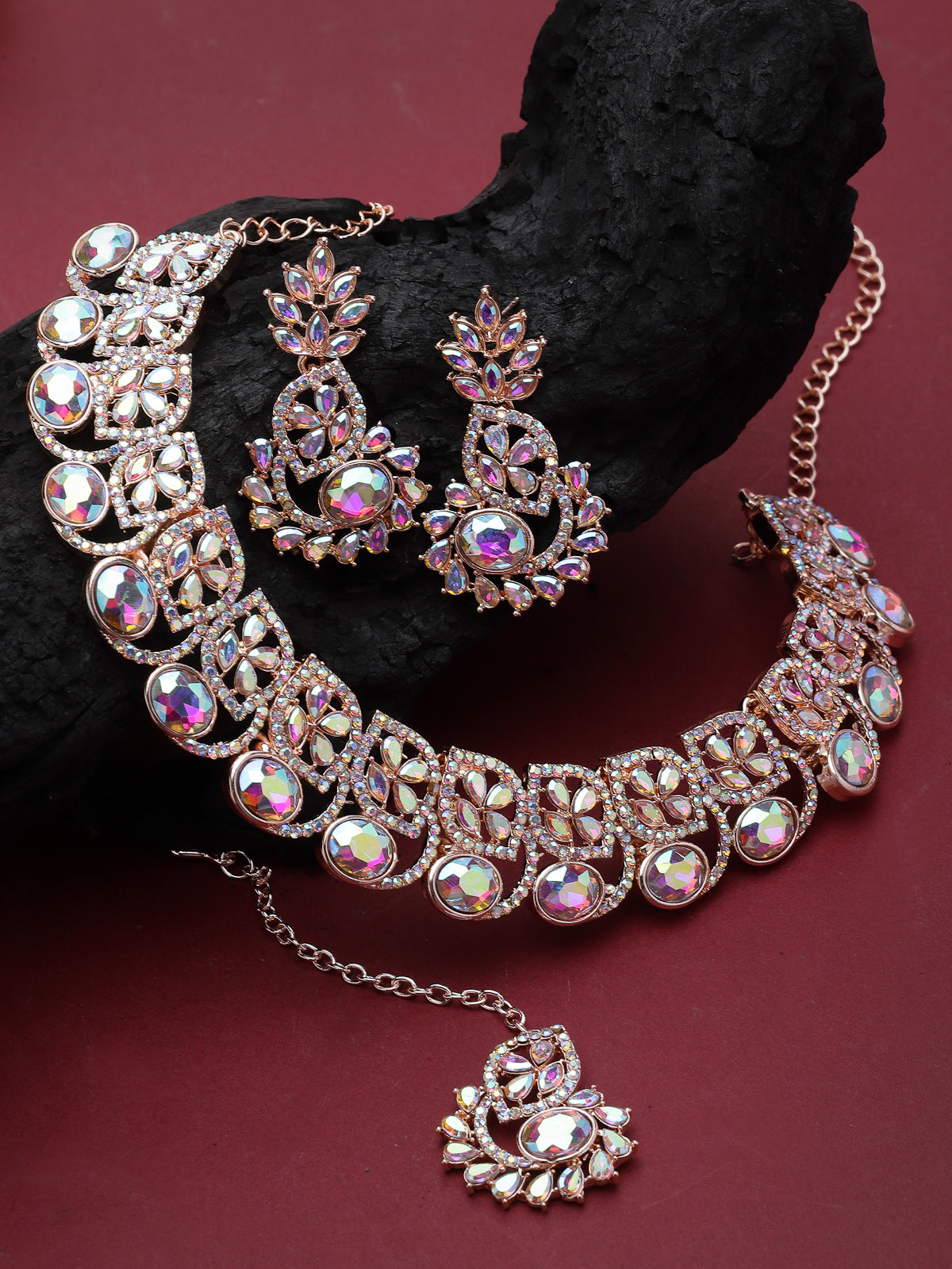 Sukkhi Flashy Rose Gold Plated Rainbow Stones Collar Bone Necklace Set With Earring And Maangtika | Jewellery Set For Women (NS104988)