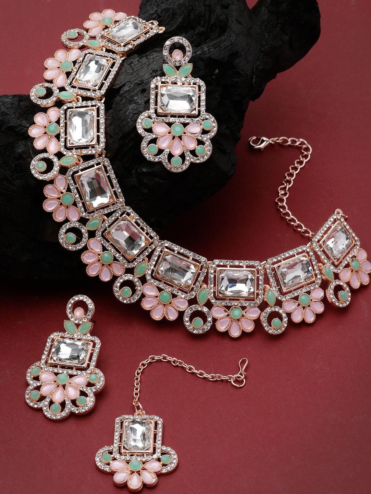 Sukkhi Good-Looking Rose Gold Plated Pink & Mint Green AD Stone Collar Bone Necklace Set With Earring And Maangtika | Jewellery Set For Women (NS105487)