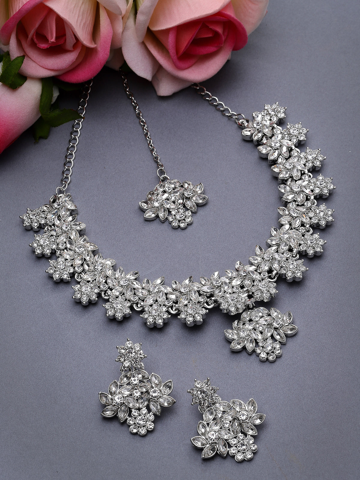 Sukkhi Smashing Rhodium Plated Silver AD White Stone Floral Collar Bone Necklace Set With Earring And Maangtika | Jewellery Set For Women (NS105549)