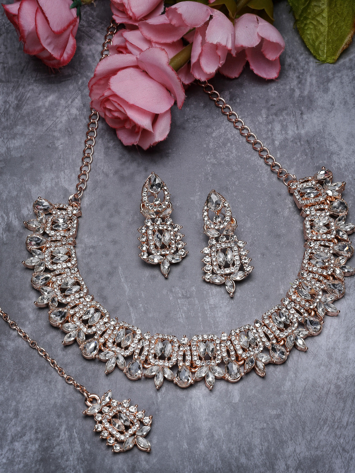Sukkhi Trendy Gold Plated Rose Gold AD White Stone Collar Bone Necklace Set With Earring And Maangtika | Jewellery Set For Women (NS105605)
