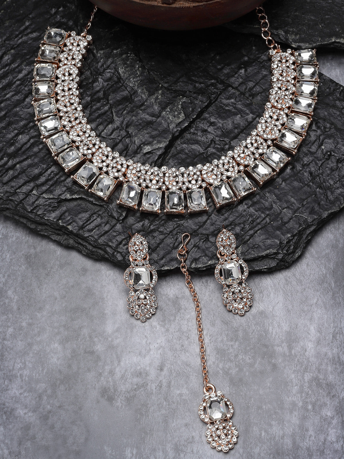 Sukkhi Tasteful Rose Gold AD White Stones Collar Bone Necklace Set With Earring And Maangtika | Jewellery Set For Women (NS105619)