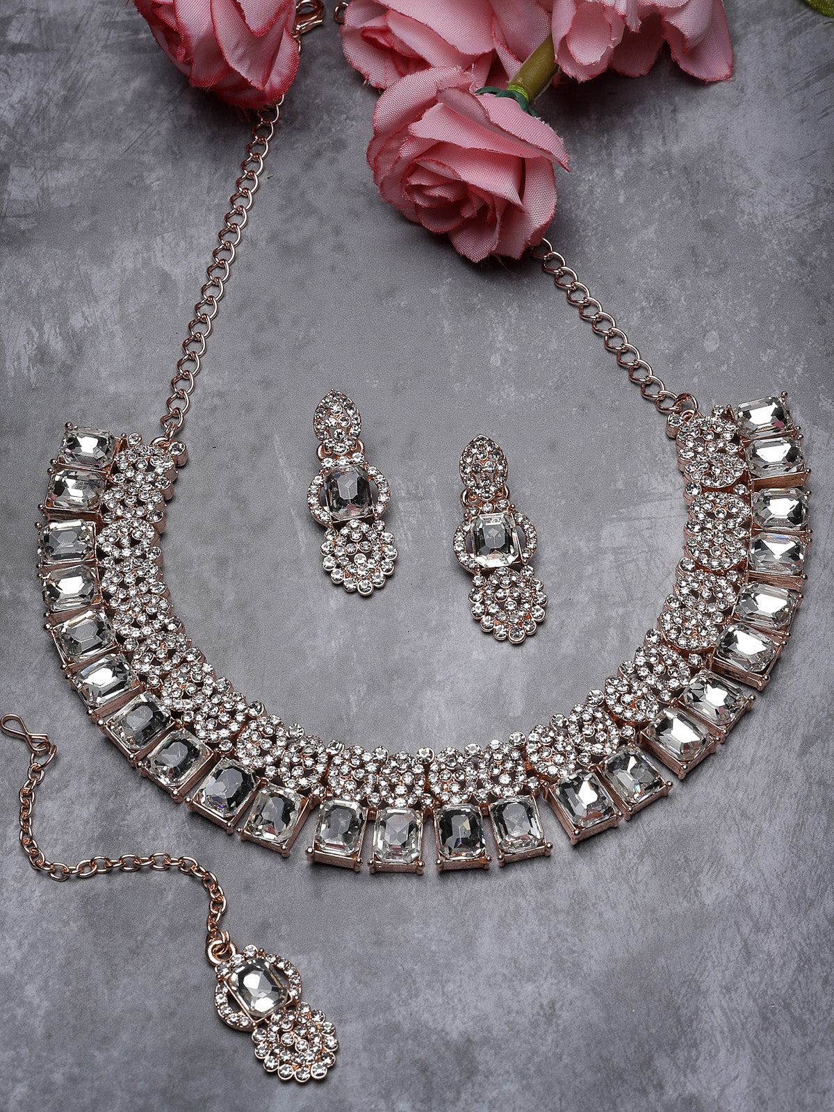 Sukkhi Tasteful Rose Gold AD White Stones Collar Bone Necklace Set With Earring And Maangtika | Jewellery Set For Women (NS105619)