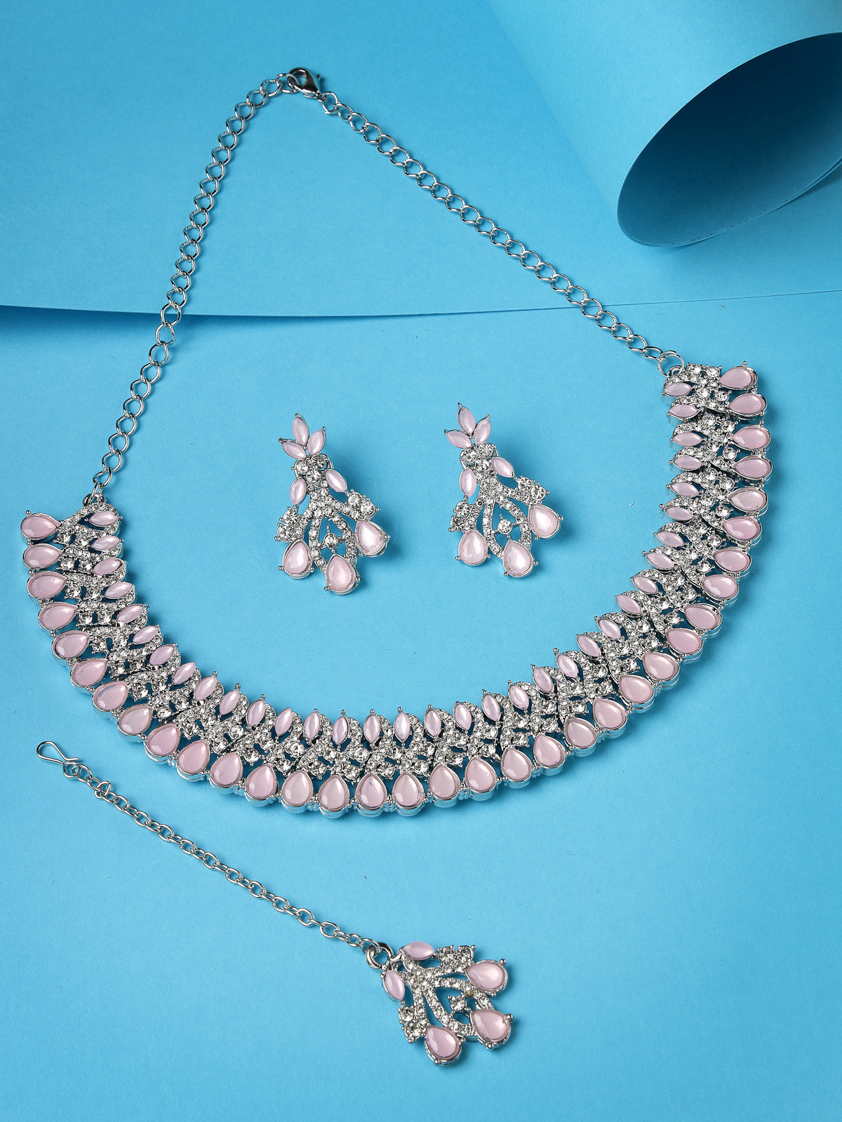Sukkhi Exquisite Rhodium Plated Pink AD White Stone Collar Bone Necklace Set With Earring And Maangtika | Jewellery Set For Women (NS105621)