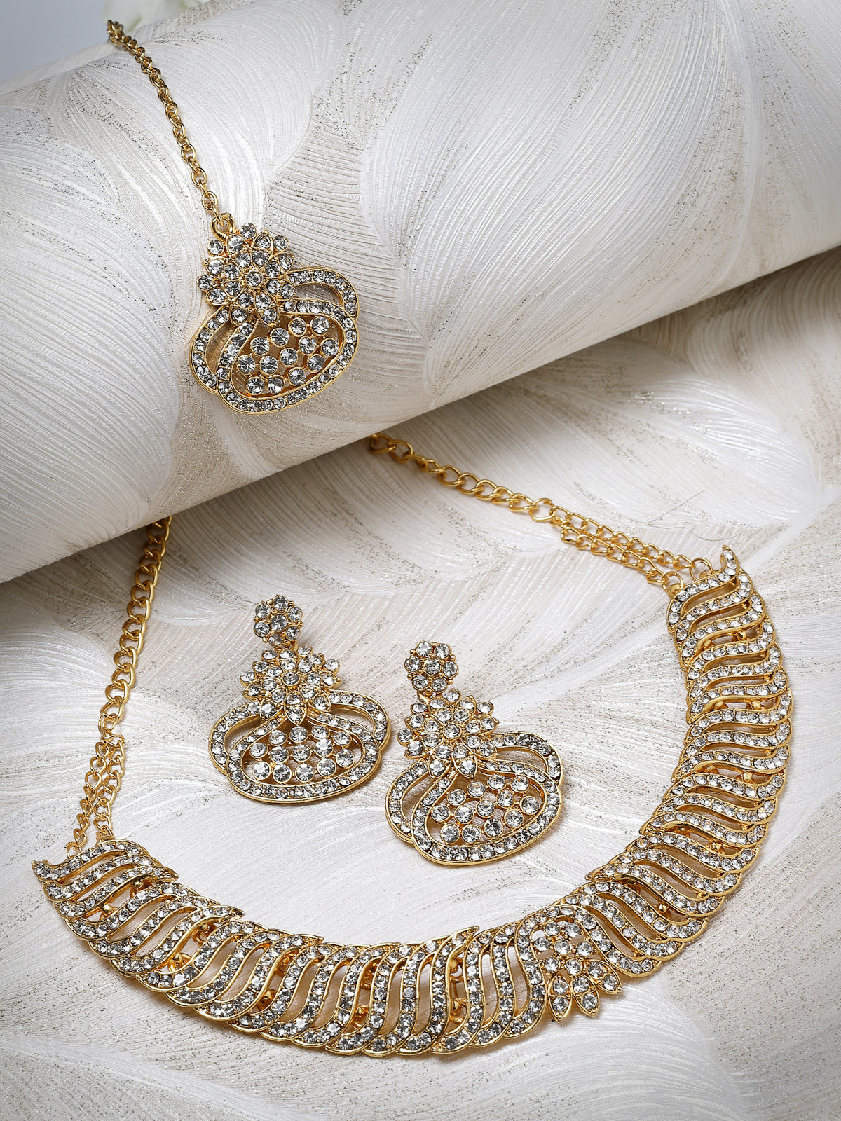 Sukkhi Soothing Gold Plated AD White Stone Collar Bone Necklace Set With Earring And Maangtika | Jewellery Set For Women (NS105636)