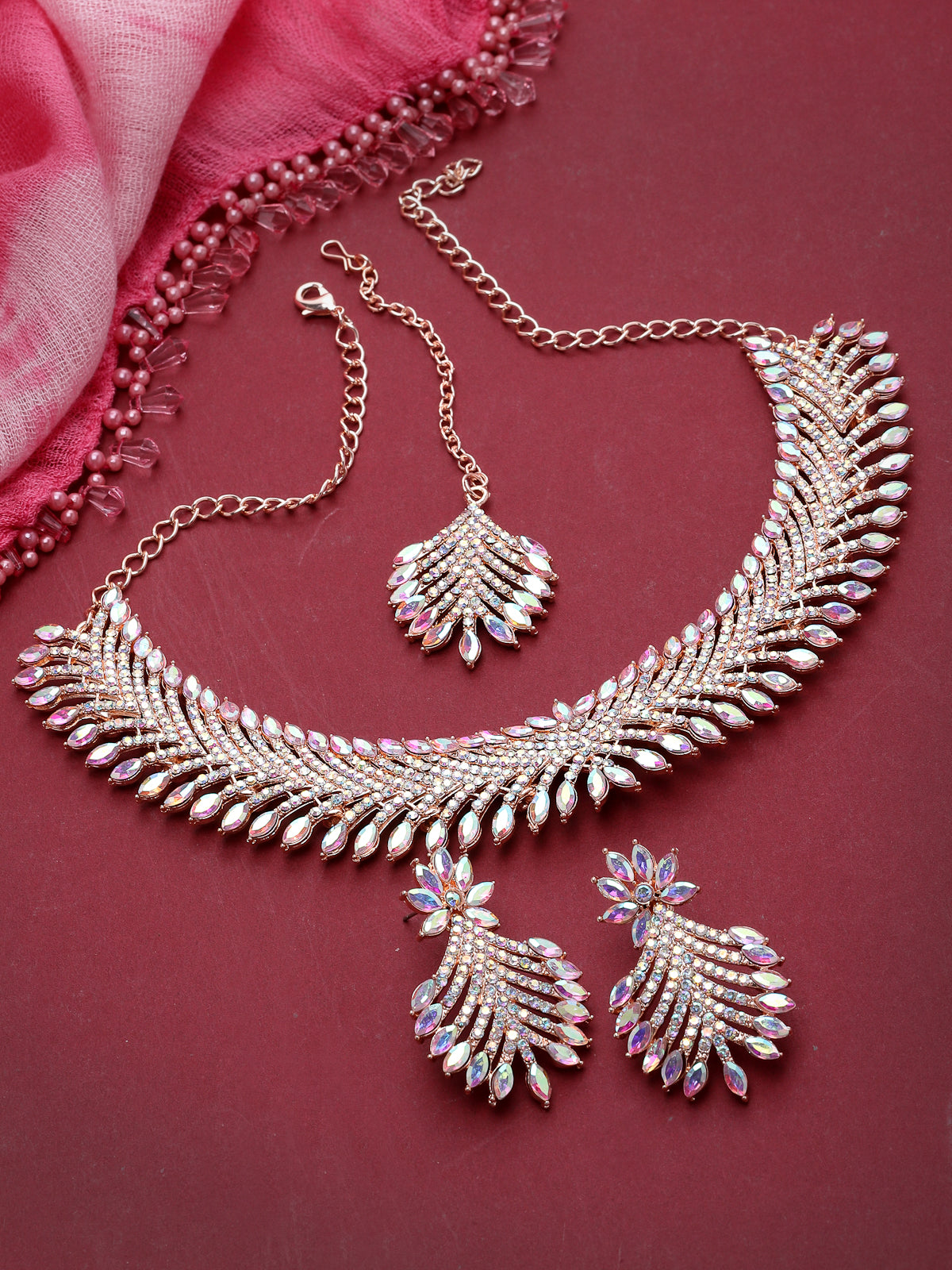 Sukkhi Graceful Rose Gold Plated Rainbow Collar Bone Necklace Set With Earring And Maangtika | Jewellery Set For Women (NS105639)