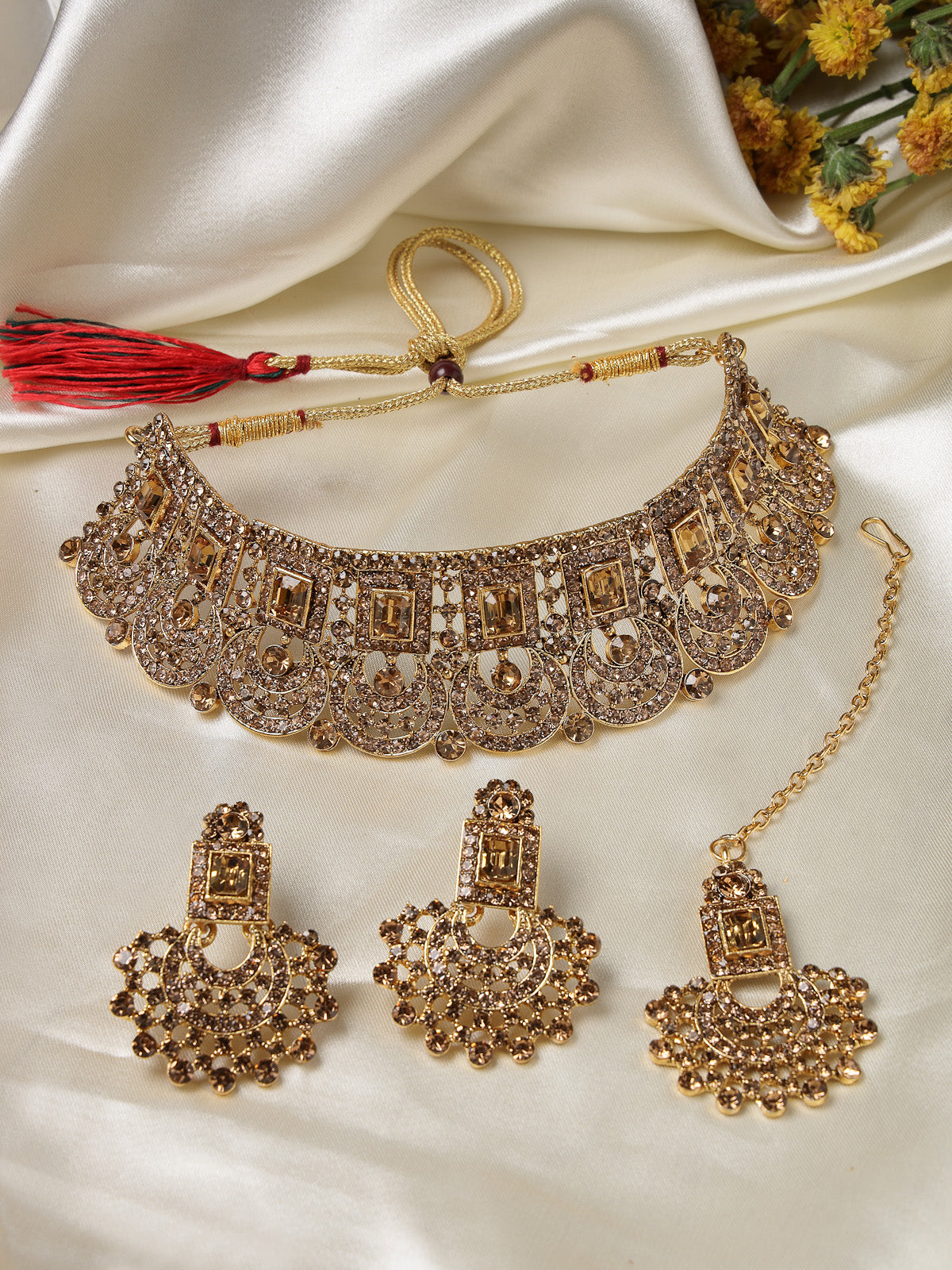 Sukkhi Graceful Curve Shaped Gold Plated Golden AD Stone Choker Necklace Set With Earring And Maangtika | Jewellery Set For Women (NS105644)