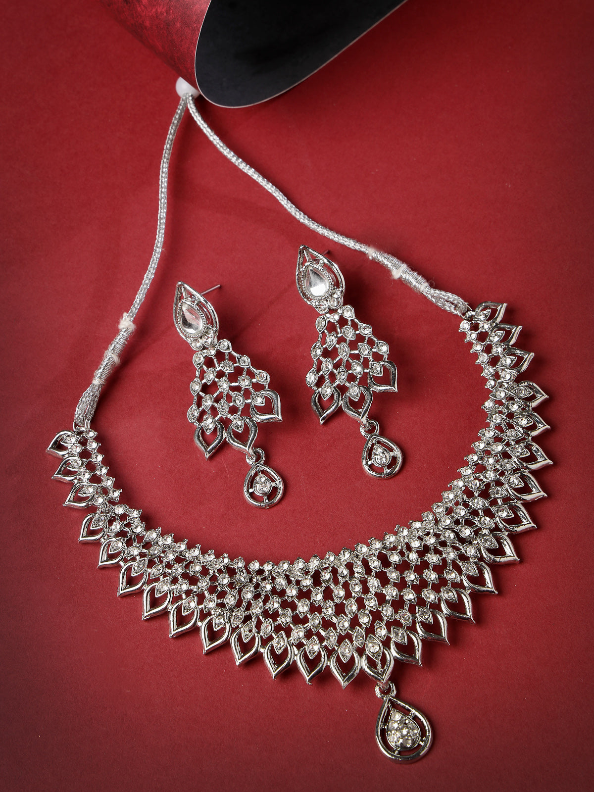 Sukkhi Striking Rhodium Plated Silver AD White Stone Collar Bone Necklace Set And Earring | Jewellery Set For Women (NS105661)