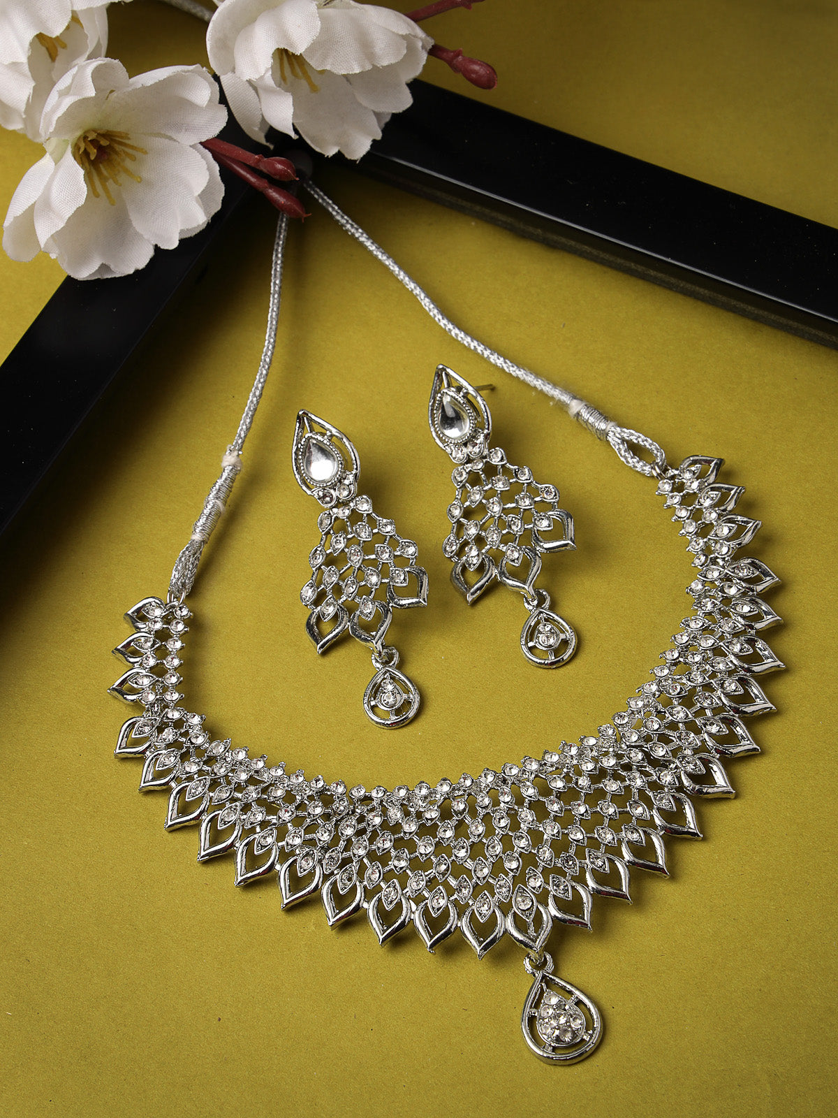 Sukkhi Striking Rhodium Plated Silver AD White Stone Collar Bone Necklace Set And Earring | Jewellery Set For Women (NS105661)