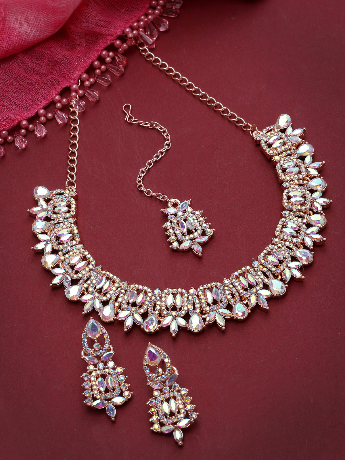 Sukkhi Versatile Rose Gold Plated Rainbow Stone Collar Bone Necklace Set With Earring And Maangtika | Jewellery Set For Women (NS105696)