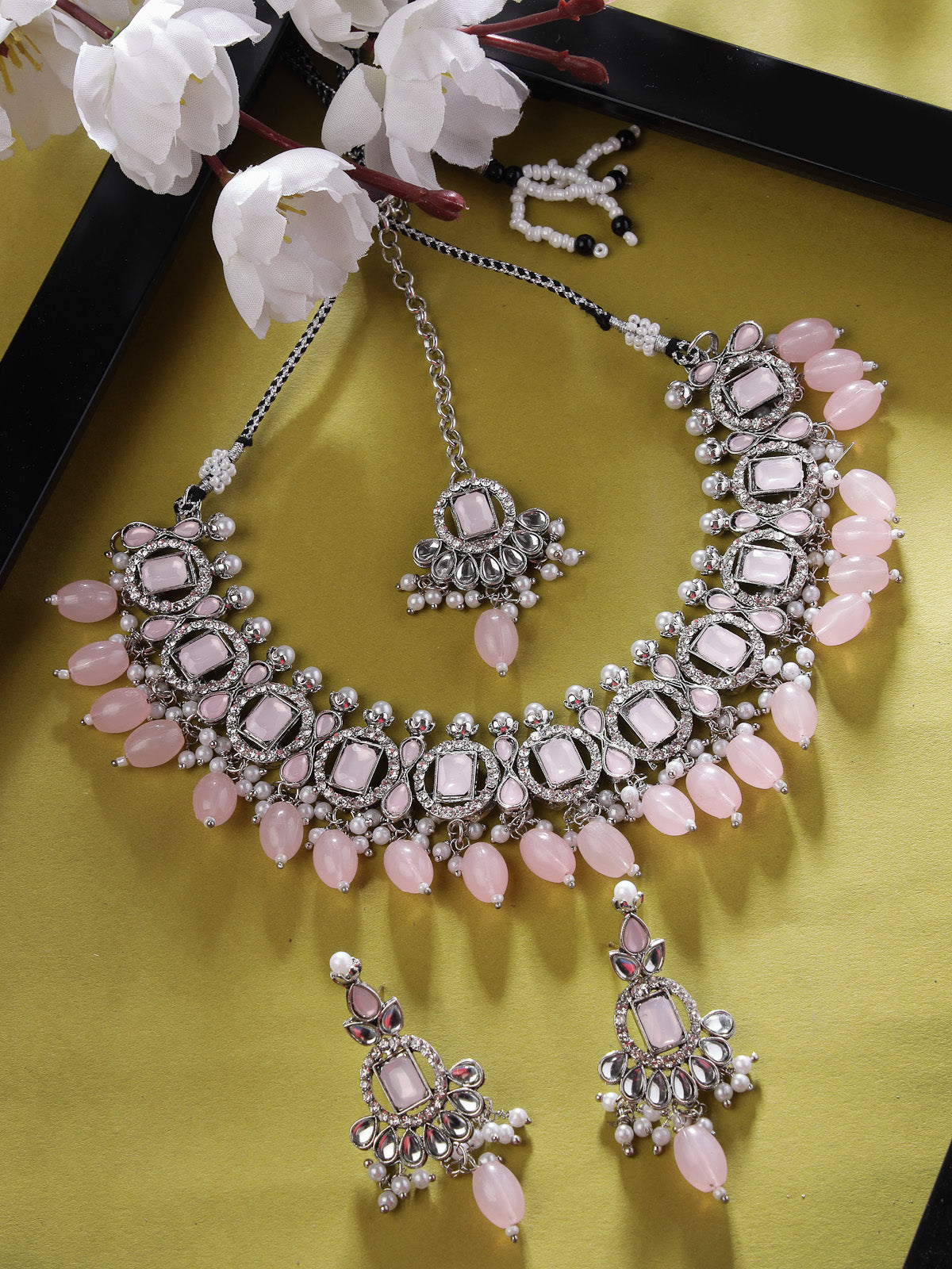Sukkhi Artistic Rhodium Plated Pink AD Stone Collar Bone Necklace Set With Earring And Maangtika | Jewellery Set For Women (NS105698)