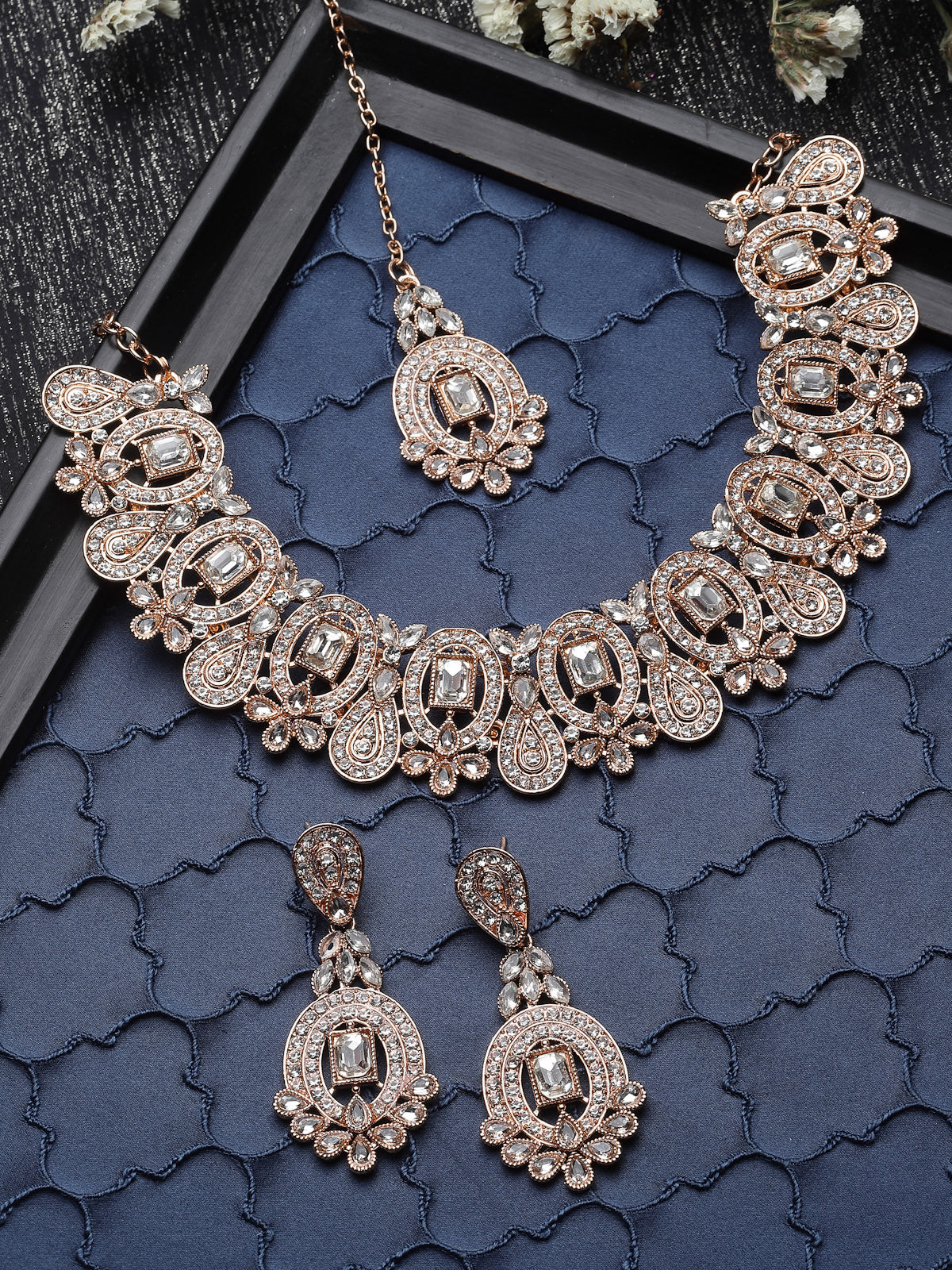 Sukkhi Creative Gold Plated AD Stone Collar Bone Necklace Set With Earring And Maangtika | Jewellery Set For Women (NS105699)