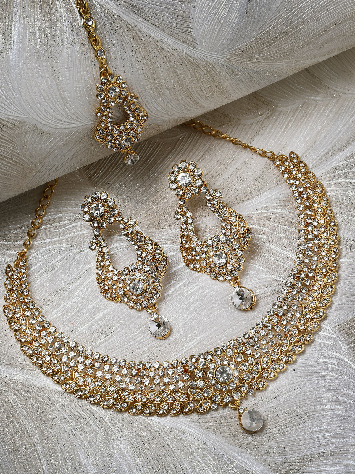 Sukkhi Exhilarating Gold Plated AD White Stone Collar Bone Necklace Set With Earring And Maangtika | Jewellery Set For Women (NS105714)