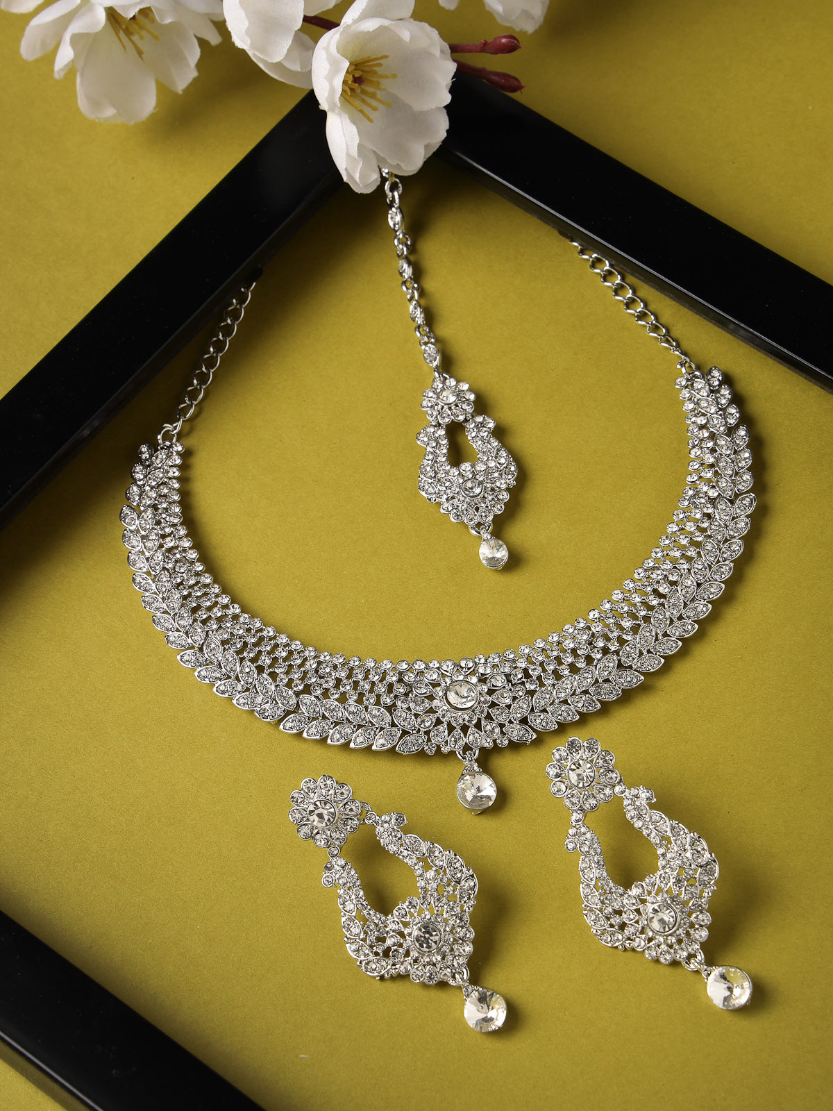 Sukkhi Handcrafted Rhodium Plated Silver AD White Stone Collar Bone Necklace Set With Earring And Maangtika | Jewellery Set For Women (NS105715)