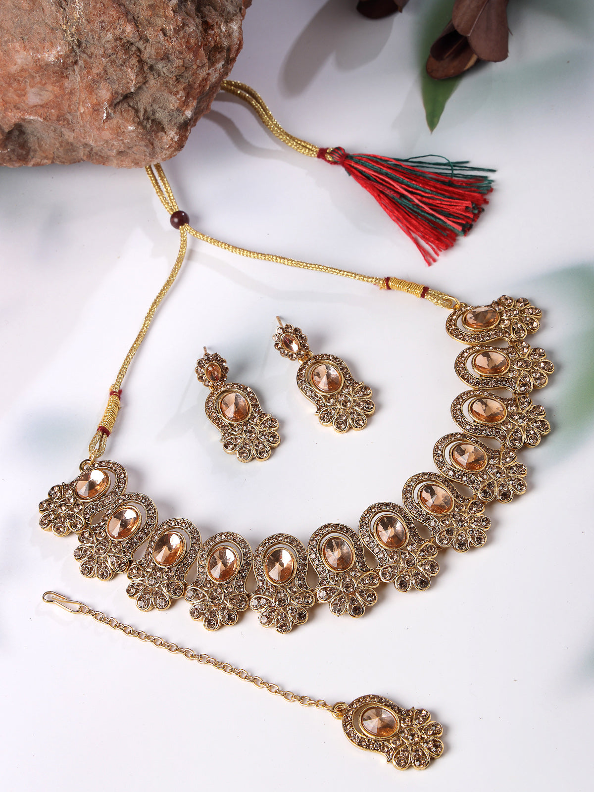 Sukkhi External Gold Plated AD Stone Collar Bone Necklace Set With Earring And Maangtika | Jewellery Set For Women (NS105722)