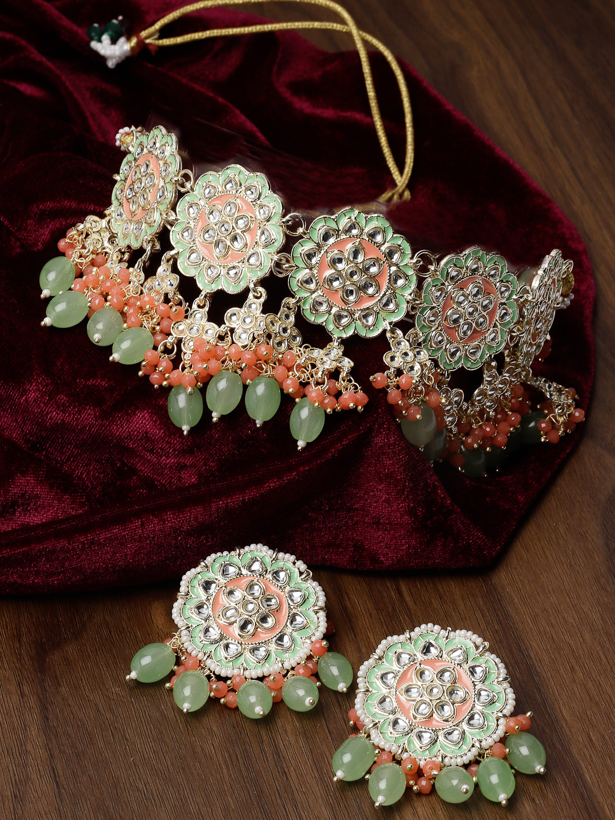 Studio Sukkhi Flawless Gold Plated Mint Green & Red Beads Beads Cluster Drops Kundan Choker Necklace Earring Set For Women NS105804
